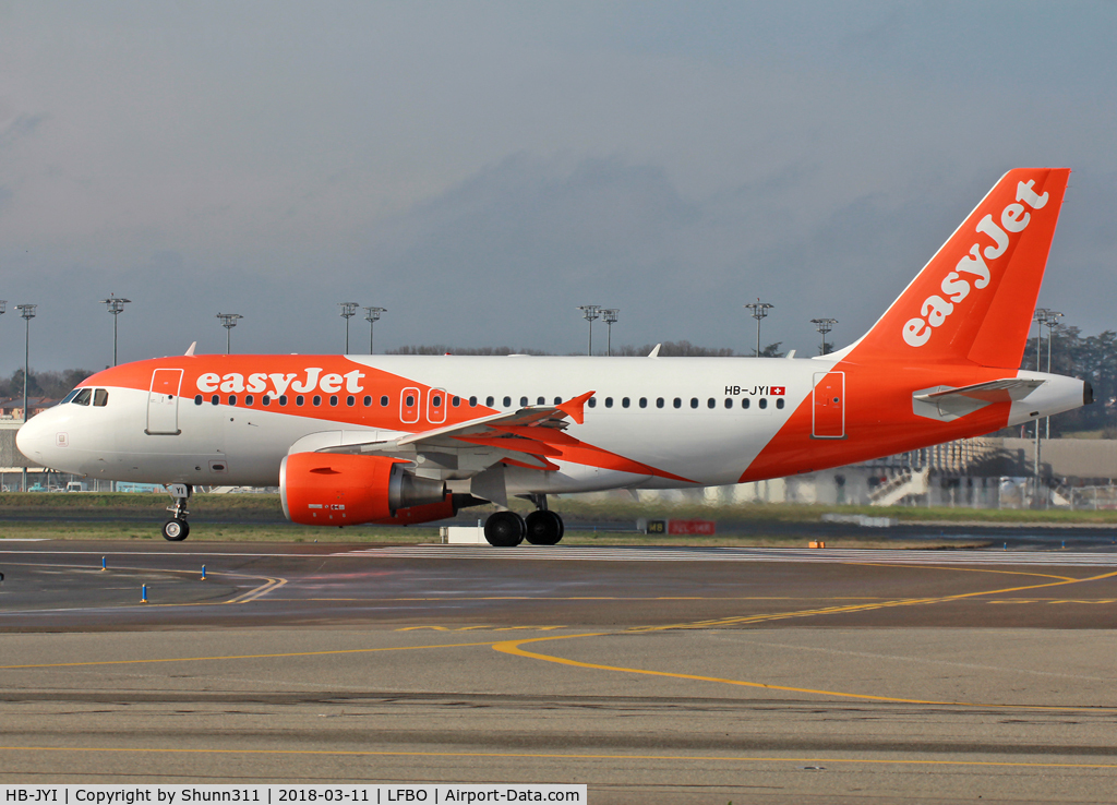 HB-JYI, 2011 Airbus A319-111 C/N 4744, Ready for departure from rwy 14L in new c/s