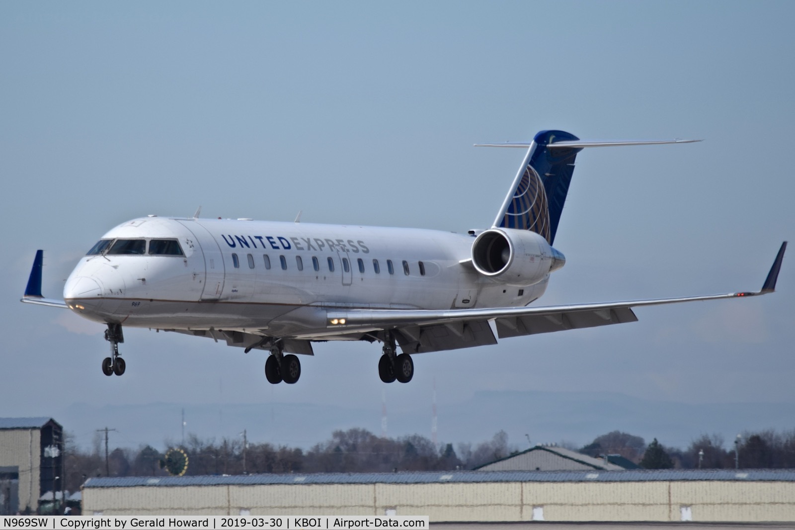 N969SW, 2003 Bombardier CRJ-200ER (CL-600-2B19) C/N 7876, Landing RWY 10L.