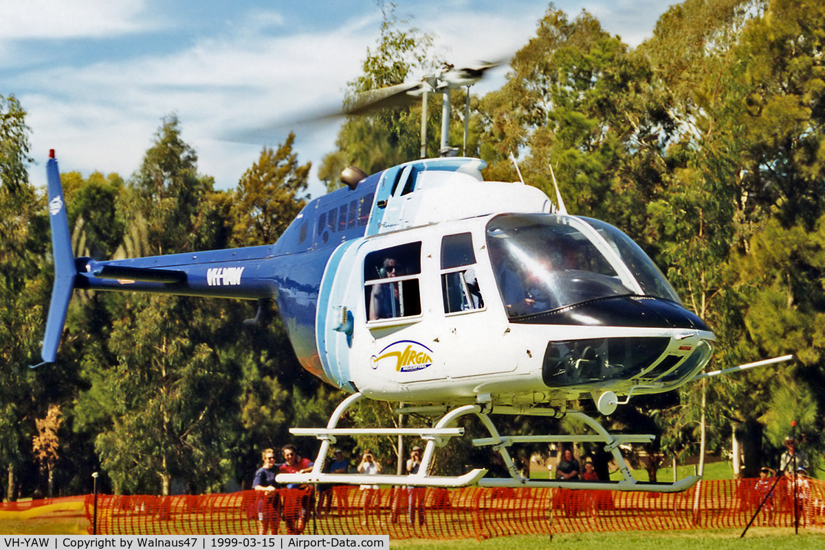 VH-YAW, 1973 Bell 206B Jetranger II C/N 942, Virgin Helicopters ACT Bell 206B JetRanger VH-YAW Cn 942 hovering close to Lake Burley Griffin Canberra during Canberra Week festivities on 15Mar1999 (Canberra Day).