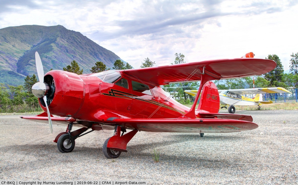 CF-BKQ, 1943 Beech D17S Staggerwing C/N 4849, Among the aircraft at a Canadian Owners and Pilots Association fly-in at Carcross, Yukon.