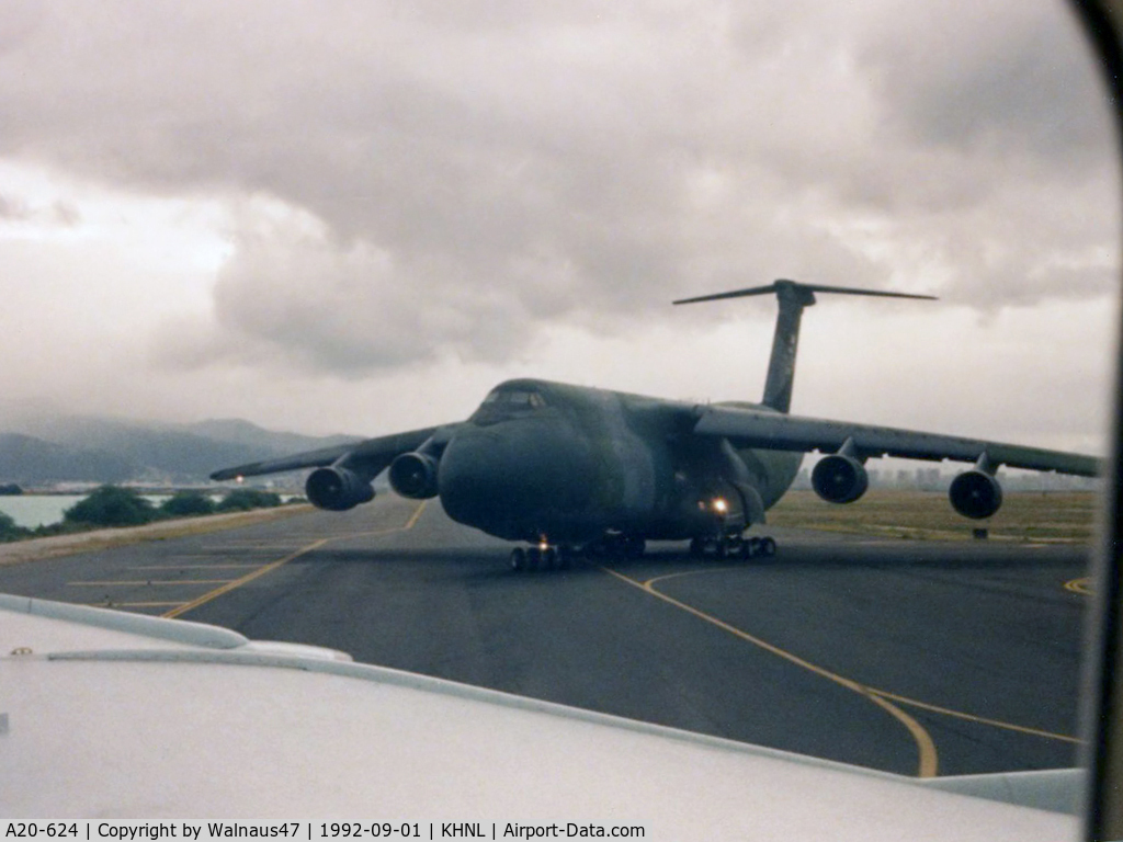 A20-624, 1968 Boeing 707-338C C/N 19624, B707 Window View, showing a USAF C-5B Galaxy taxying at Hickam AFB in Honolulu, Hawaii. Photo taken from RAAF Boeing 707-338C(KC) A20-624, before a 4.4 hour flight to San Francisco KSFO on 01Sep1992.