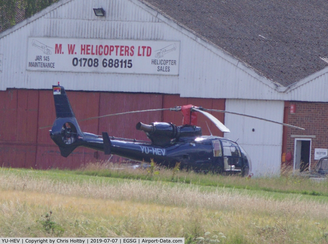 YU-HEV, 1977 Aerospatiale SA-342J Gazelle C/N 1393, Parked at Stapleford Tawney, Essex