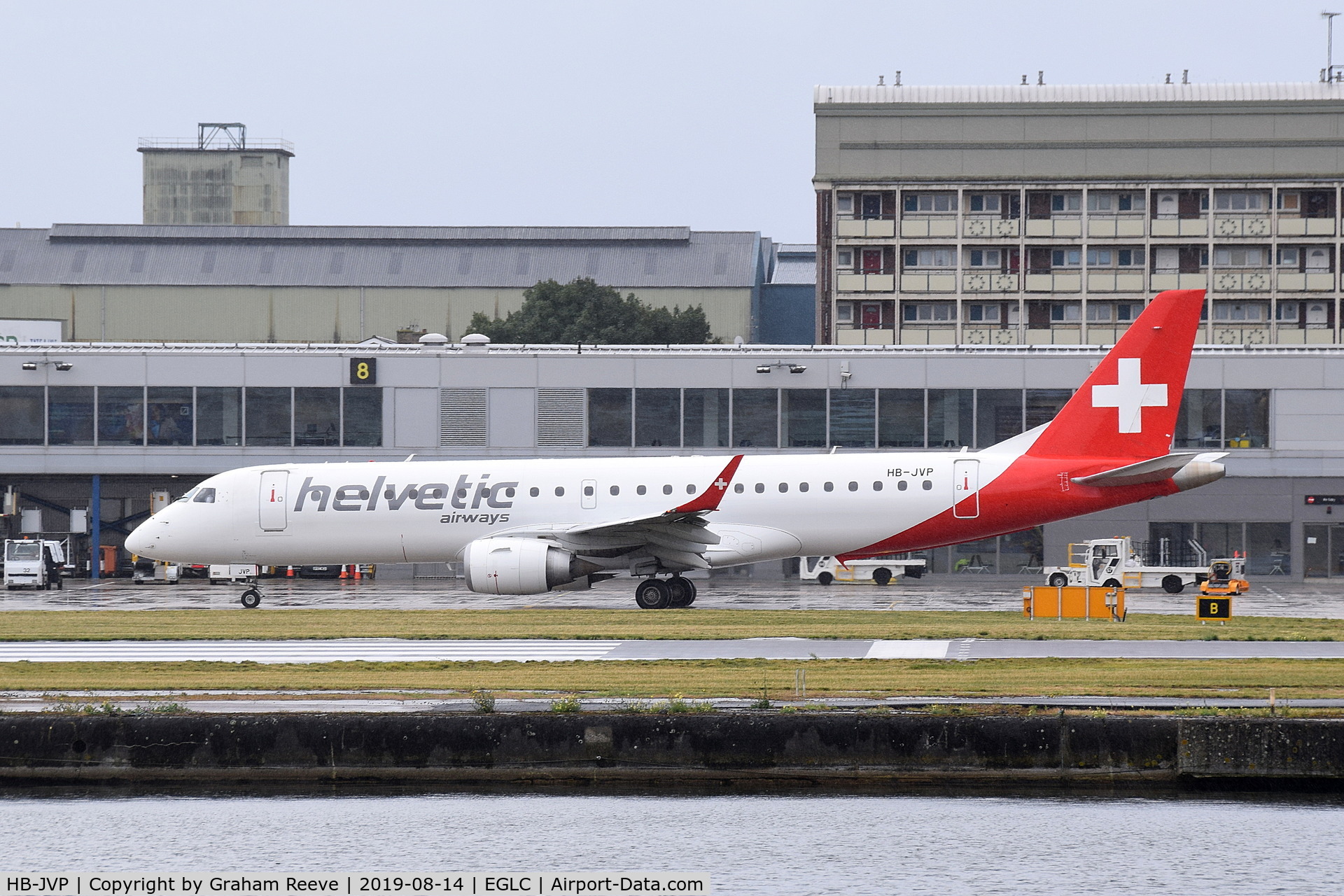 HB-JVP, 2010 Embraer 190LR (ERJ-190-100LR) C/N 19000387, Just landed at a very wet London City.