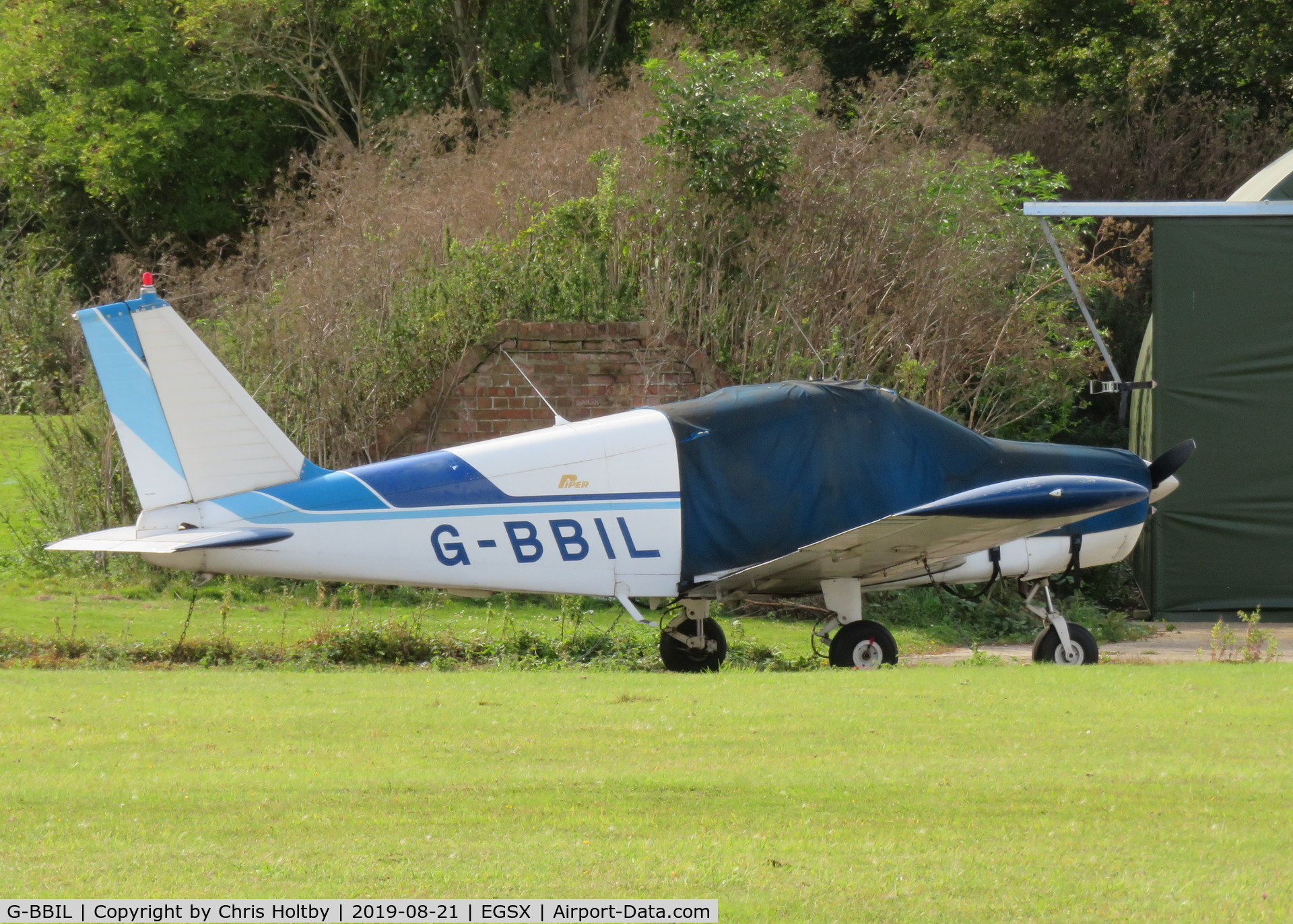 G-BBIL, 1967 Piper PA-28-140 Cherokee C/N 28-22567, Cherokee covered & parked at North Weald