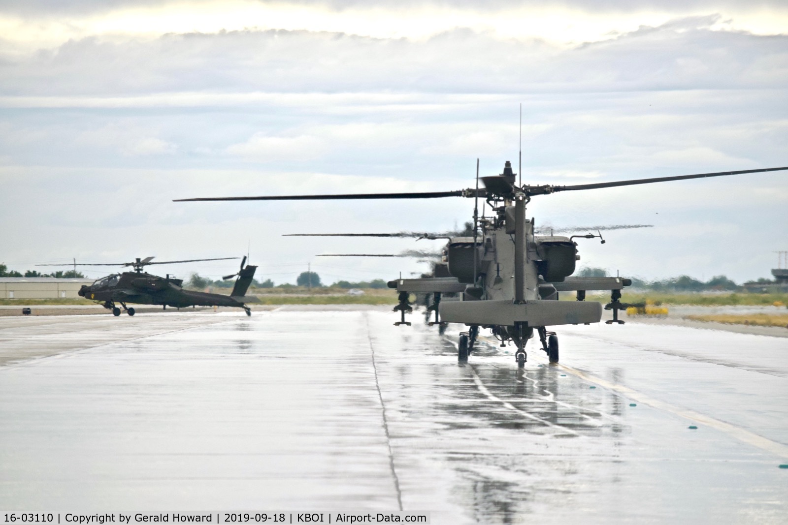 16-03110, 2016 Boeing AH-64E Apache Guardian C/N MM110, Taxiing Bravo behind 3 other AH-64Es.
