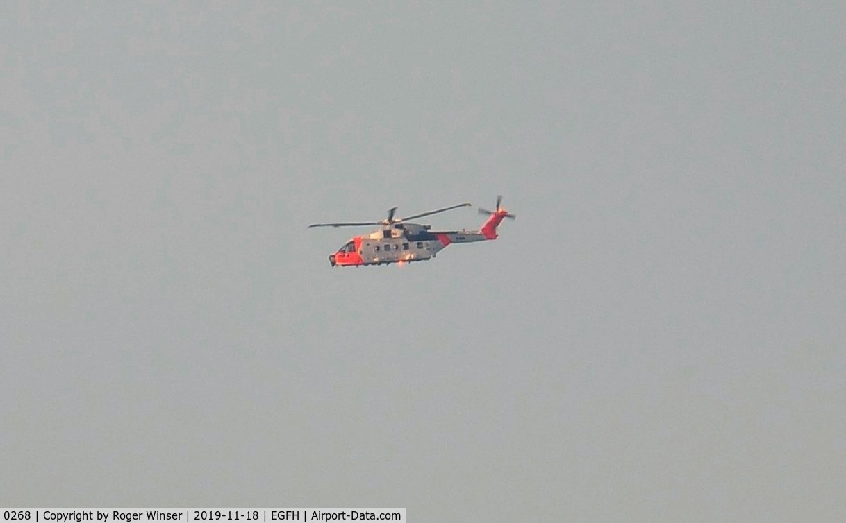 0268, 2017 AgustaWestland AW101 Merlin Mk.612 C/N 50268, Distant view of the Royal Norwegian Air Force search and rescue helicopter seen on trials to the North of the airport. Registered ZZ103 before delivery to the air force in Norway.