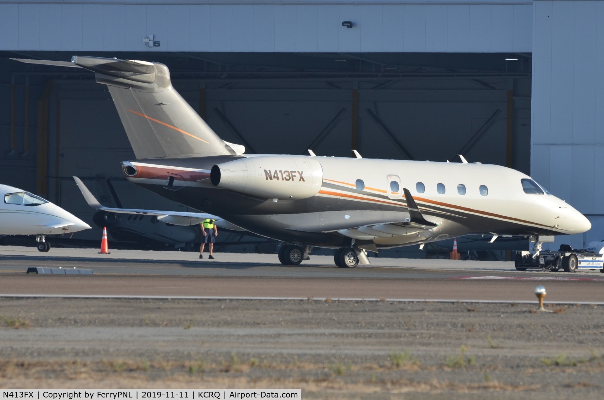 N413FX, 2017 Embraer EMB-545 Legacy 450 C/N 55010030, Flexjet EMB545 under tow after arrival from Mexico.