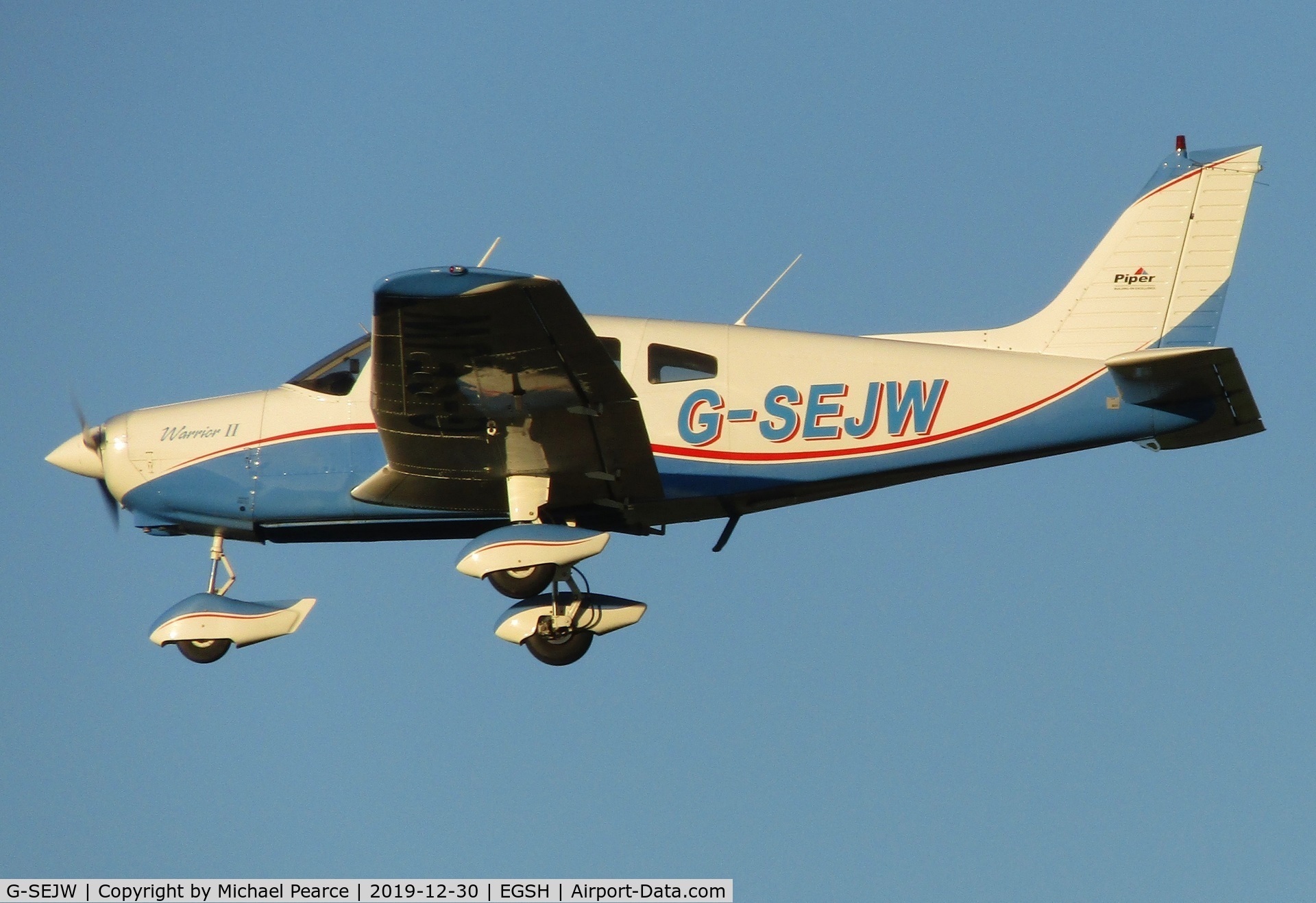 G-SEJW, 1978 Piper PA-28-161 Cherokee Warrior II C/N 28-7816469, On final for RWY 27 during missed approach training.
