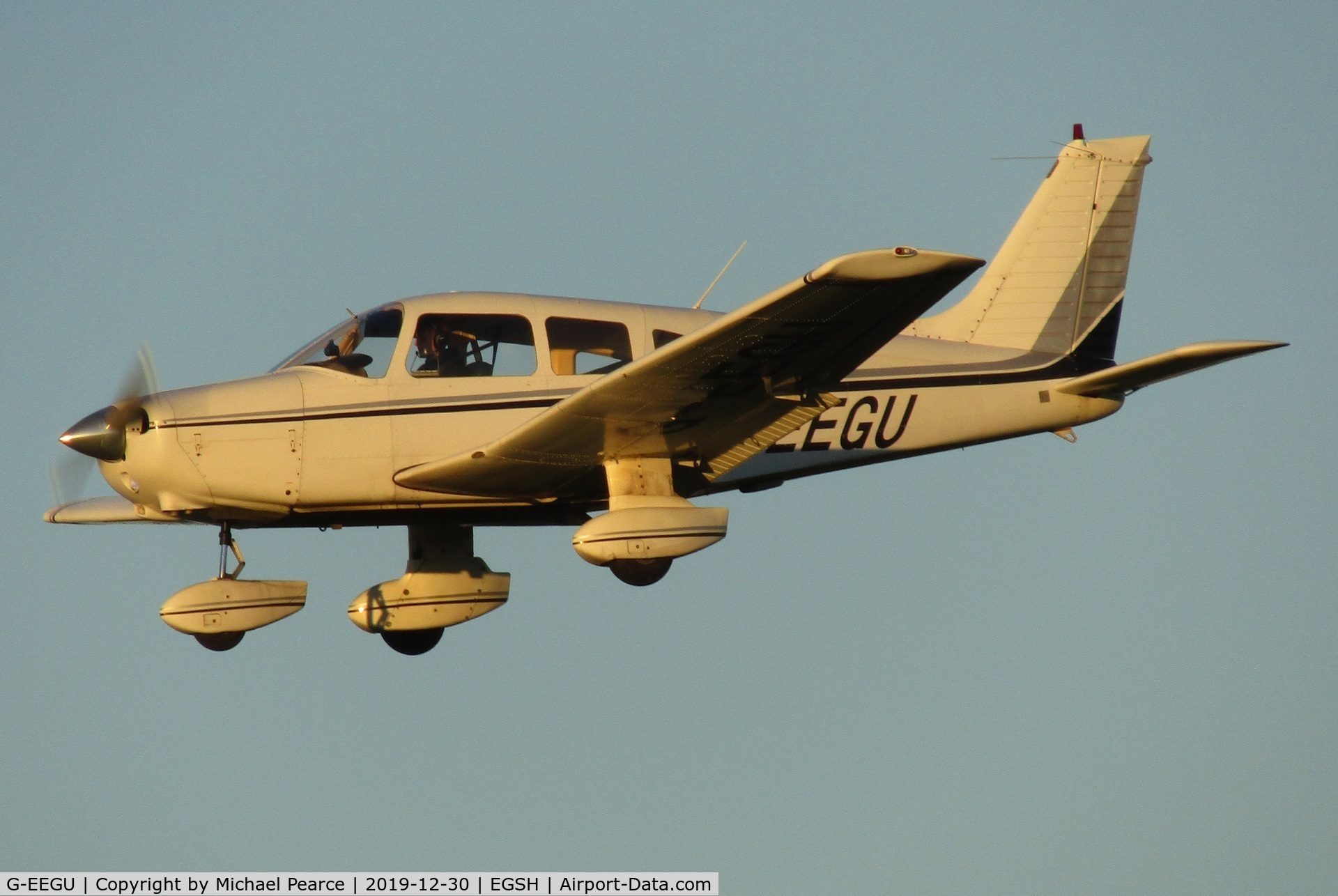 G-EEGU, 1979 Piper PA-28-161 Cherokee Warrior II C/N 28-7916457, On final for RWY 27, carrying out missed approach training.