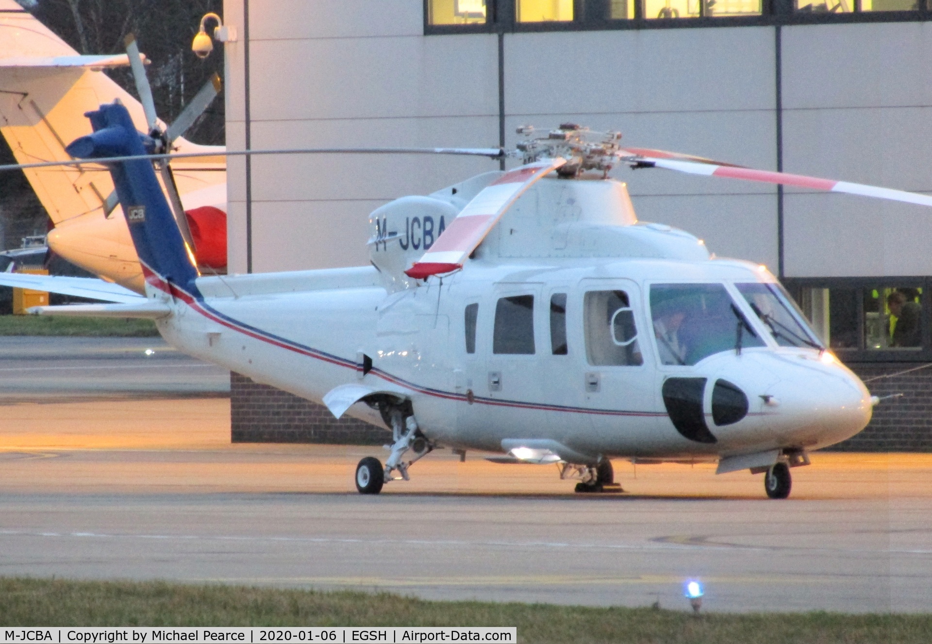 M-JCBA, 2011 Sikorsky S-76C C/N 760807, Parked on the SaxonAir ramp for an overnight stop from Derby (EGBD).