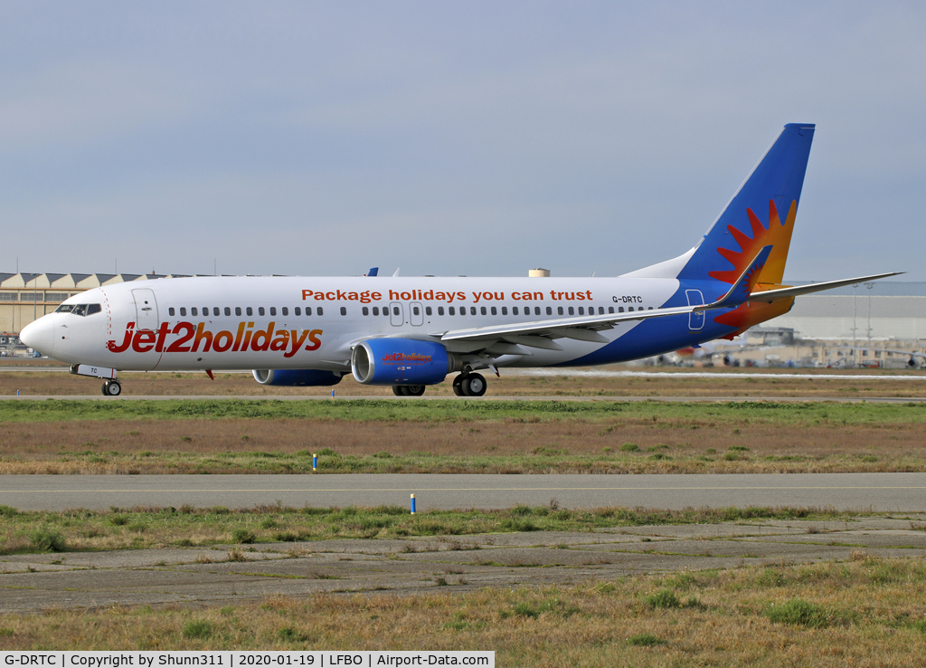 G-DRTC, 2006 Boeing 737-808 C/N 34702, Taxiing holding point rwy 32R for departure...