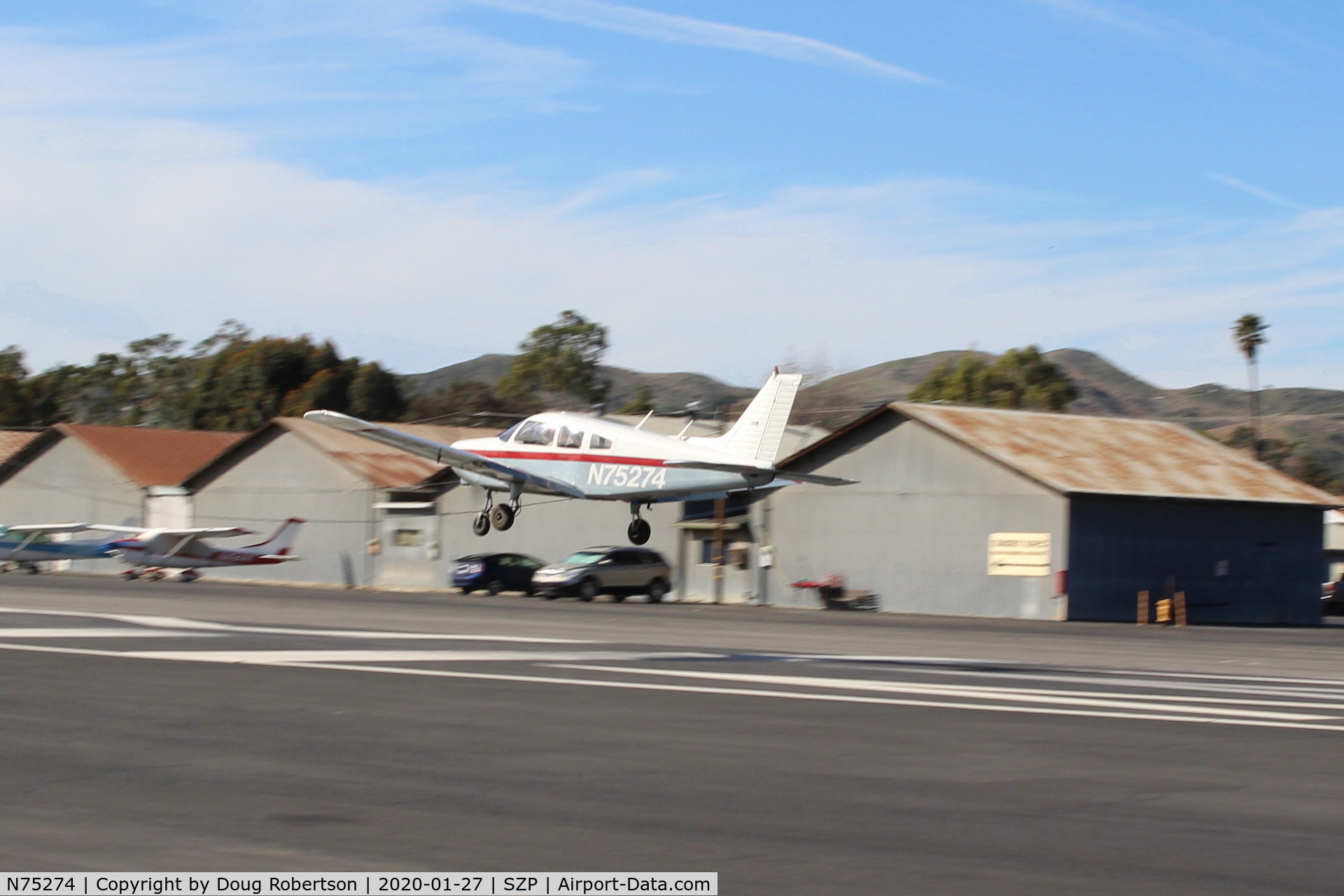 N75274, 1976 Piper PA-28-151 C/N 28-7615278, 1976 Piper PA-28 151 WARRIOR, Lycoming O-320-D3G 160 Hp (has Warrior II engine upgrade from original -E3D 150 hp.) another on final Rwy 22