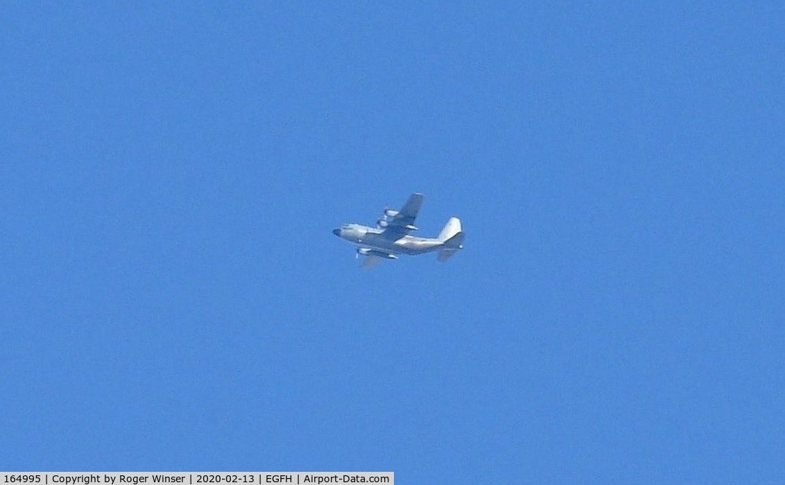 164995, Lockheed C-130T Hercules C/N 382-5300, US Navy C-130T aircraft operated by VR-53 seen flying at 15000 feet to the North of the airport.