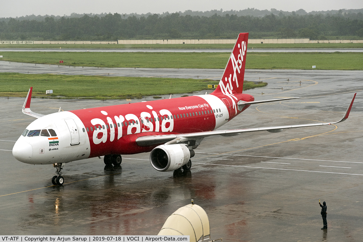 VT-ATF, 2014 Airbus A320-216 C/N 6015, Taxiing in to the gate in a downpour at Cochin International Airport.