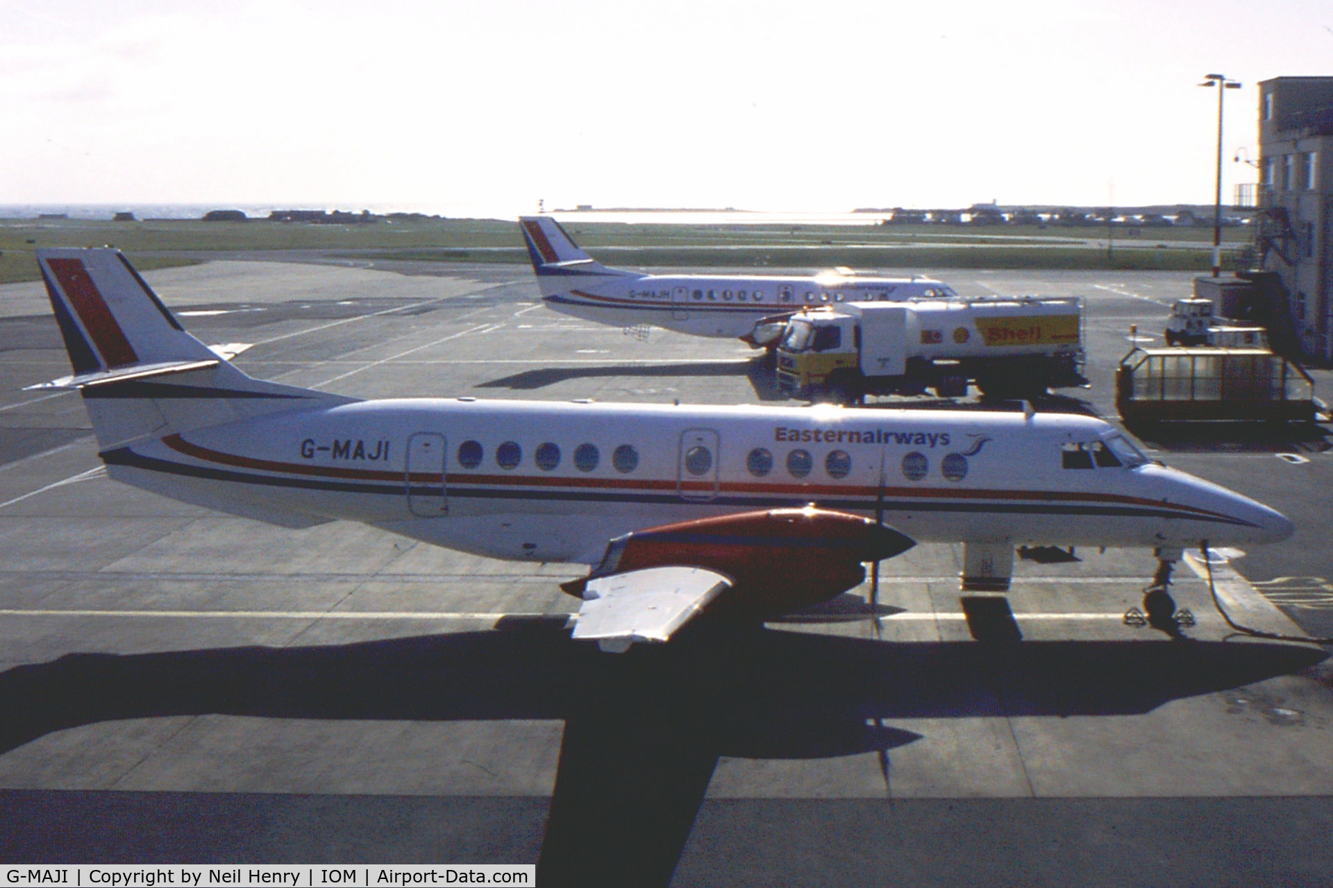 G-MAJI, 1993 British Aerospace Jetstream 41 C/N 41011, scanned from slide taken at Isle-of-Man-airport in April 2004. View shows two sister aircraft: G-MAJH and G-MAJI in Eastern Airways livery