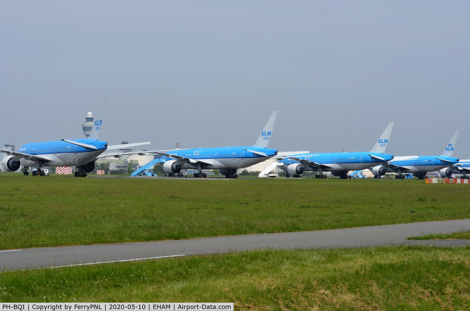 PH-BQI, 2004 Boeing 777-206/ER C/N 33714, 5 KLM B772's stored on a runway at AMS during Covid 19 crisis.