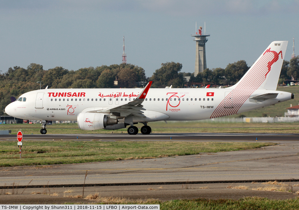 TS-IMW, 2014 Airbus A320-214 C/N 6338, Liçng up rwy 14L for departure with additional 70th anniversary patch...
