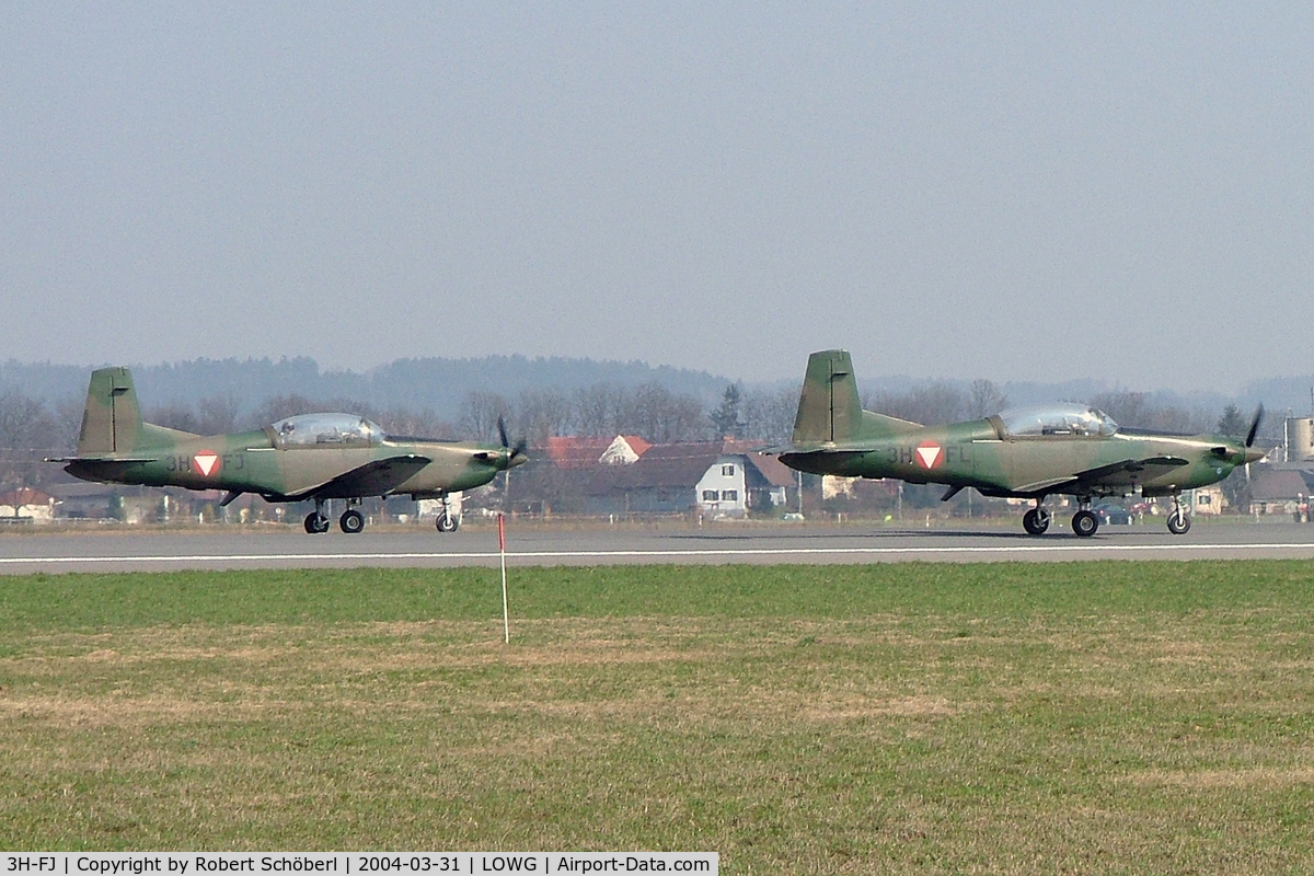 3H-FJ, Pilatus PC-7 Turbo Trainer C/N 448, 3H-FJ together with 3H-FL @ LOWG