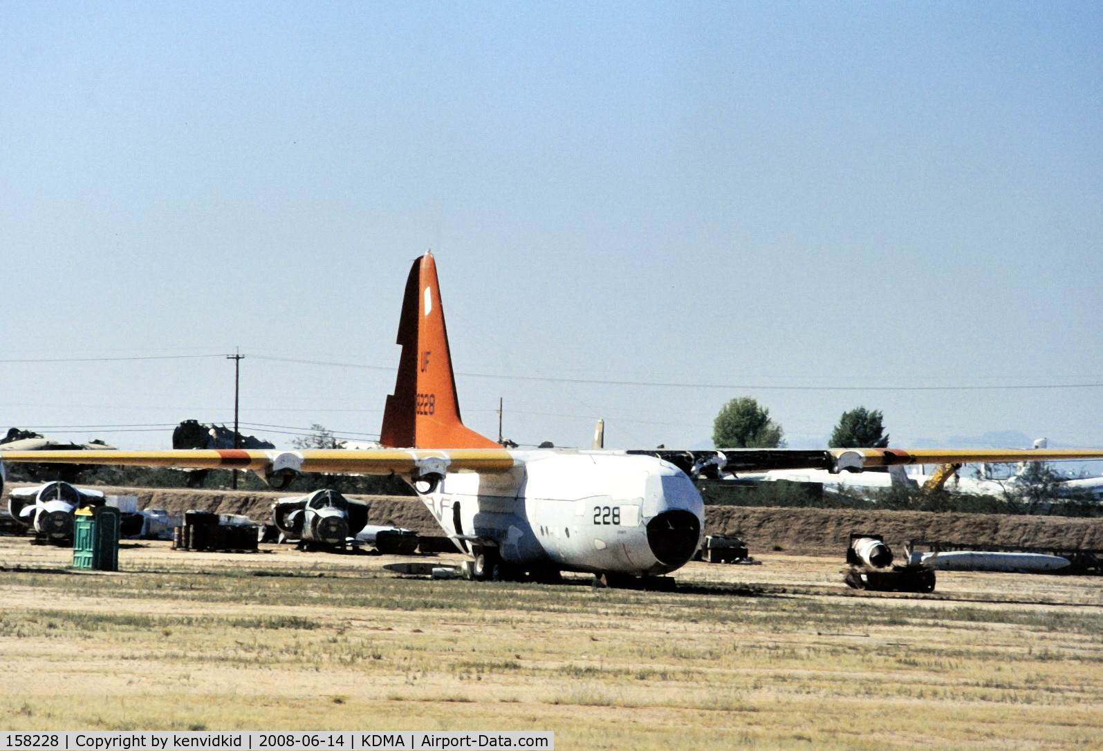 158228, 1955 Lockheed DC-130A C/N 182-3048, At Davis Monthan from an air-conditioned bus, circa 1996.