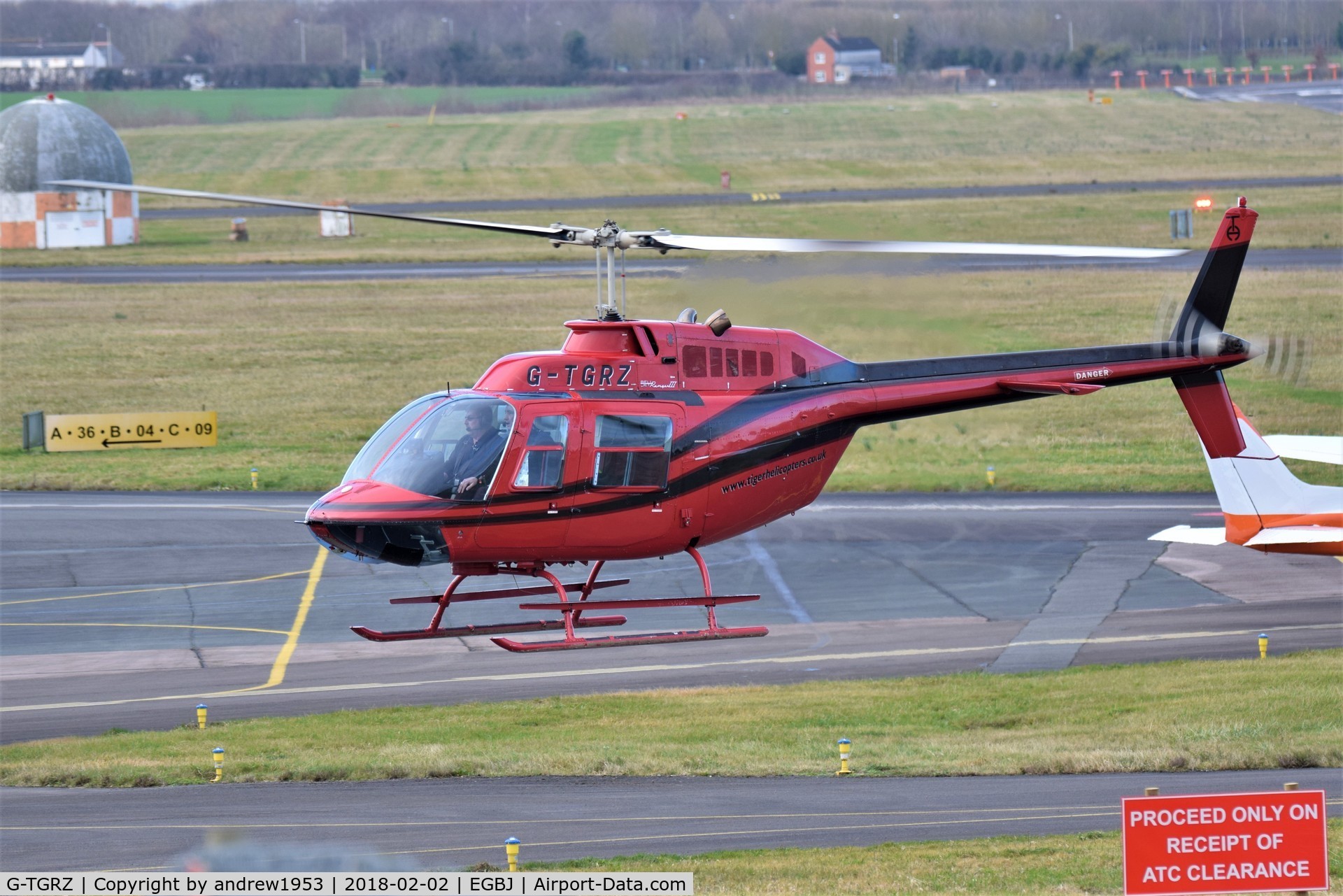 G-TGRZ, 1977 Bell 206B JetRanger II C/N 2288, G-TGRZ landing at Gloucestershire Airport.