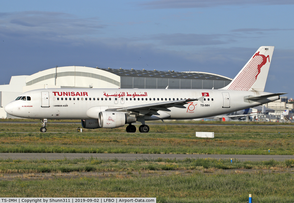 TS-IMH, 1993 Airbus A320-211 C/N 0402, Taxiing holding point rwy 32L for departure with additional 70th anniversary patch...