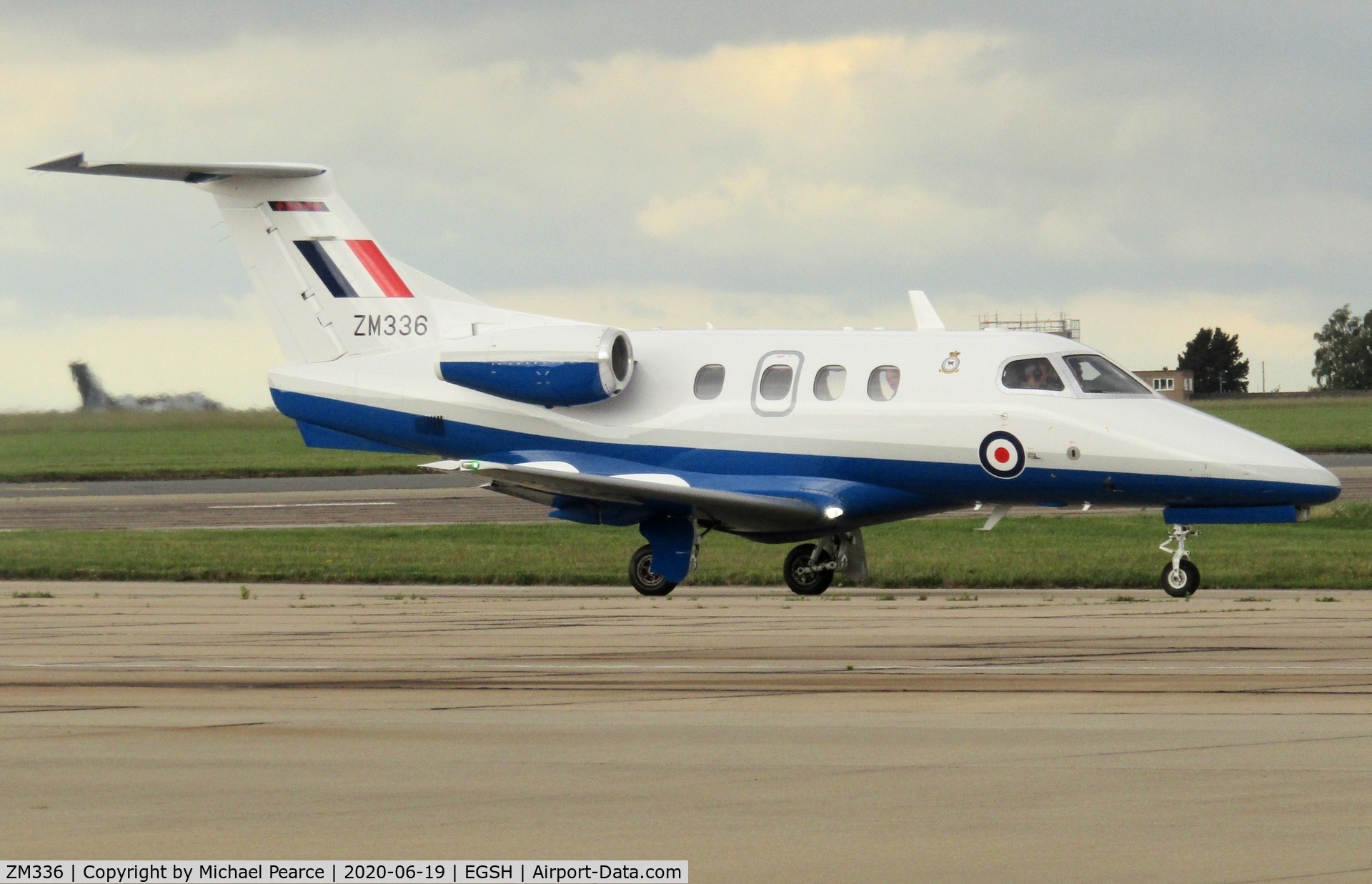ZM336, Embraer EMB-500 Phenom C/N 50000384, Returning to RAF Cranwell (CWL) after a day's visit.