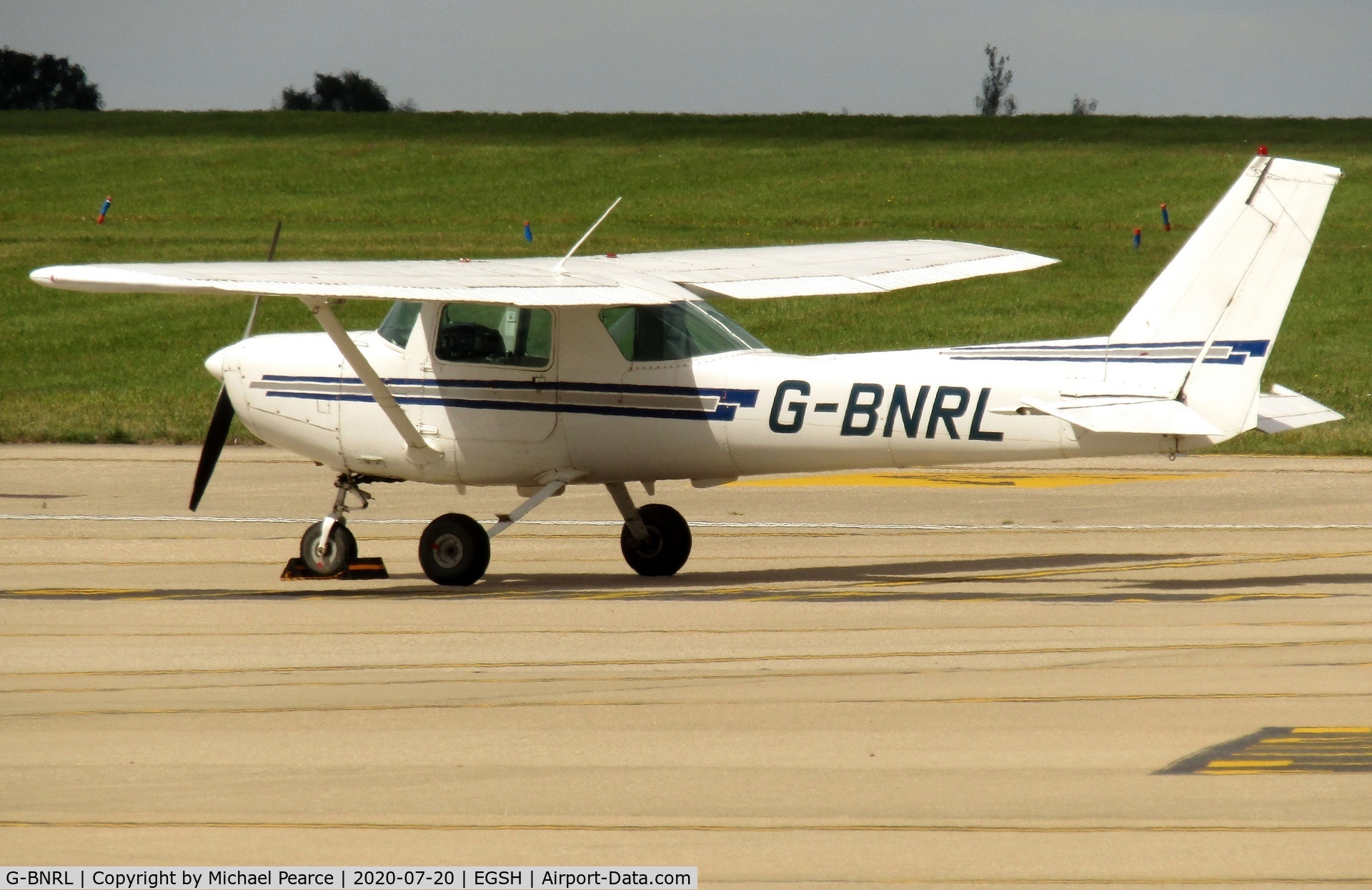G-BNRL, 1984 Cessna 152 C/N 152-84250, Parked at SaxonAir on a visit from Andrewsfield (EGSL).