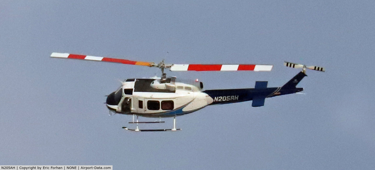 N205AH, Bell 205A-1 C/N 30206, Flying over East Wenatchee, WA