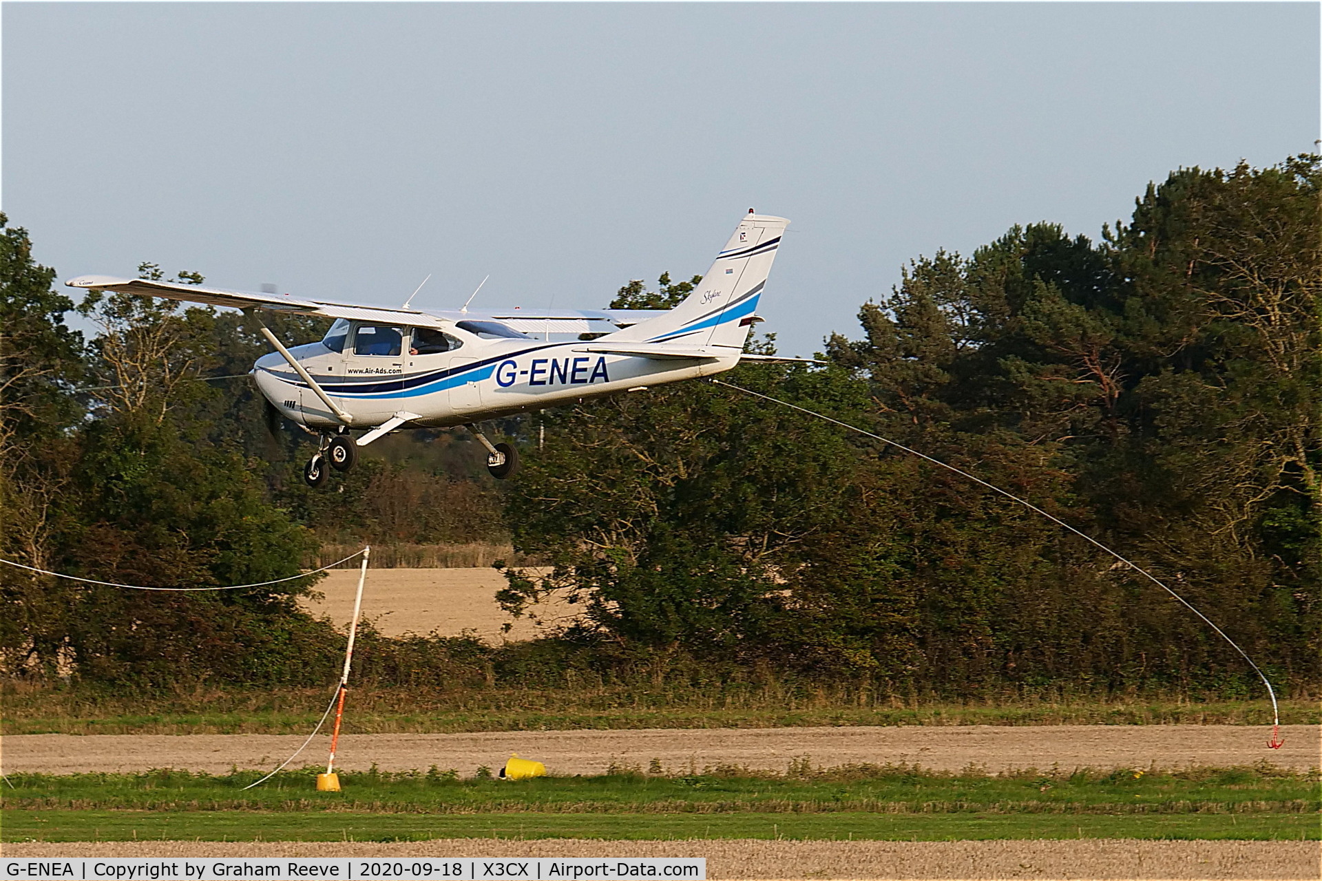 G-ENEA, 1971 Cessna 182P Skylane C/N 182-60895, Picking up a banner for towing.