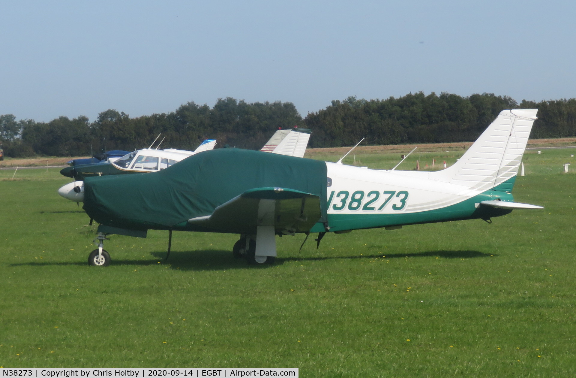 N38273, 1977 Piper PA-28R-201 Cherokee Arrow III C/N 28R-7737086, Parked and under cover at Turweston, Bucks