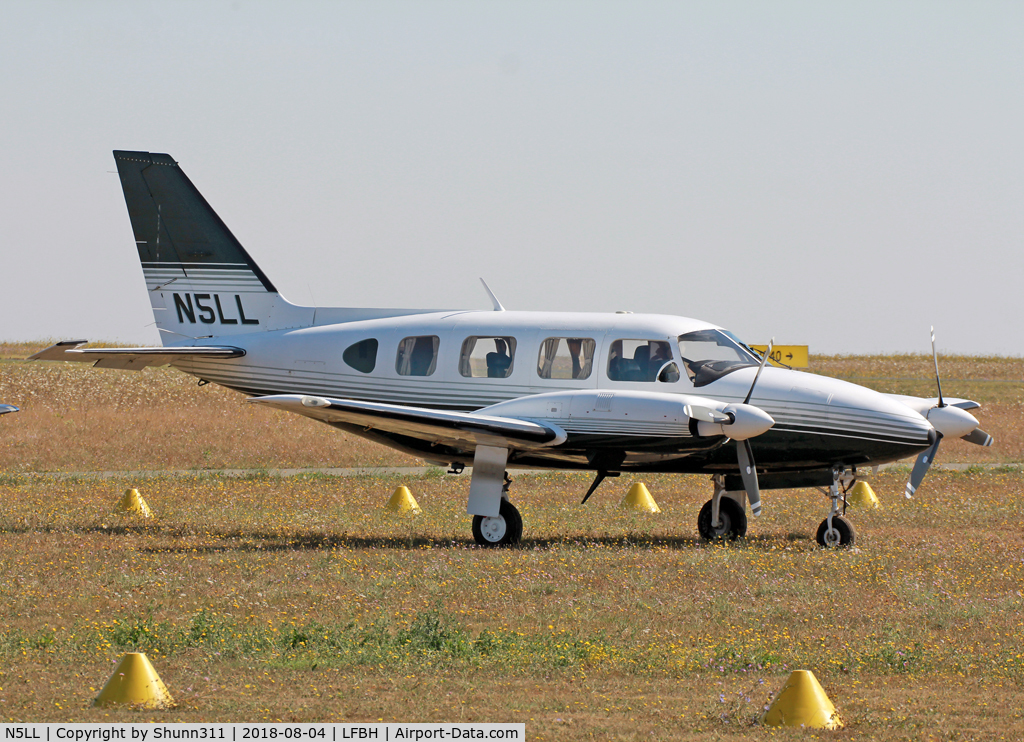 N5LL, 1978 Piper PA-31-310C Navajo C/N 31-7812041, Parked in the grass...