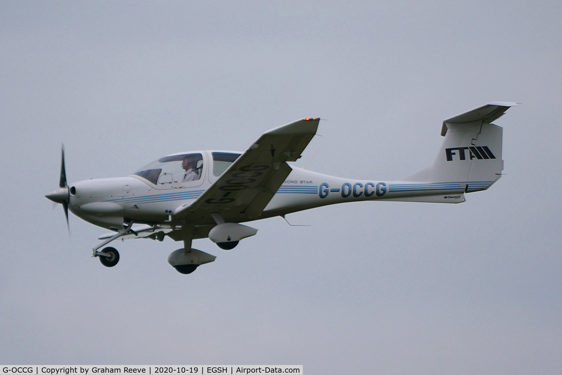G-OCCG, 2006 Diamond DA-40D Diamond Star C/N D4.230, On approach to Norwich, with new tail markings.