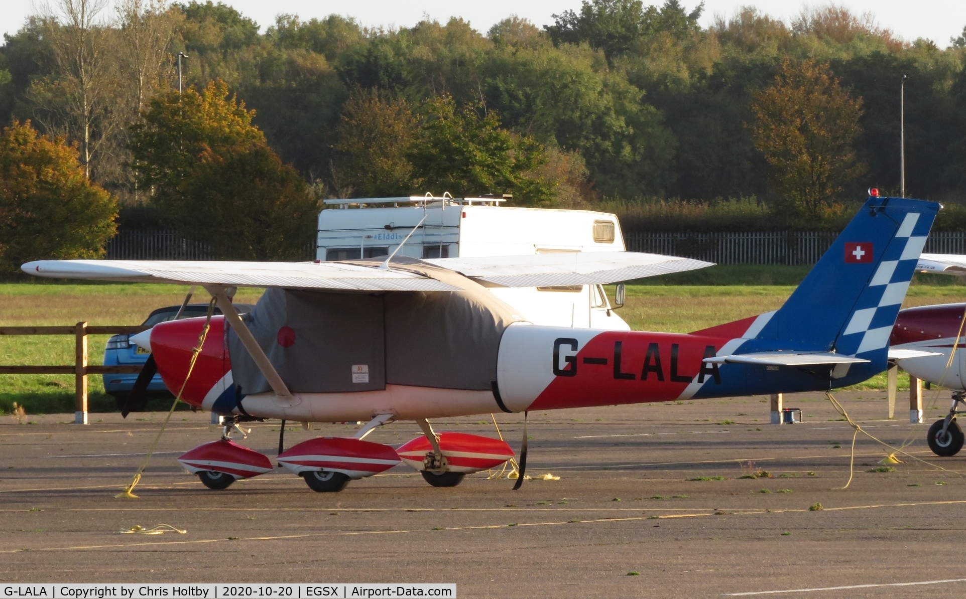 G-LALA, 1969 Reims FA150K Aerobat C/N FA1500005, Parked and now based at North Weald, Essex with its ex-Swiss insignia still showing on the tail.