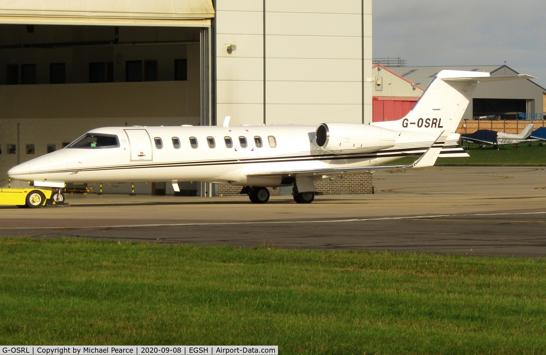 G-OSRL, 2009 Learjet 45 C/N 45-391, Under tow at SaxonAir after arrival from Bournemouth (BOH).