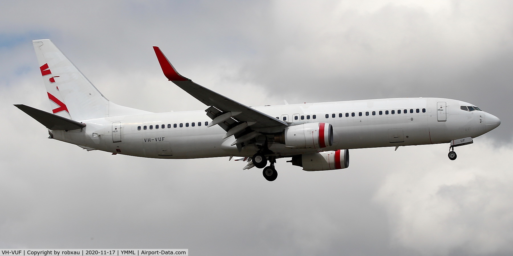 VH-VUF, 2005 Boeing 737-8FE C/N 34168, Returned to lessor from the now defunct Virgin Australia, this aircraft has now been leased to regional operator REX (regional expresss). Seen here with Virgin titles painted out on one of its training flights on approach to Melbourne runway 16 .