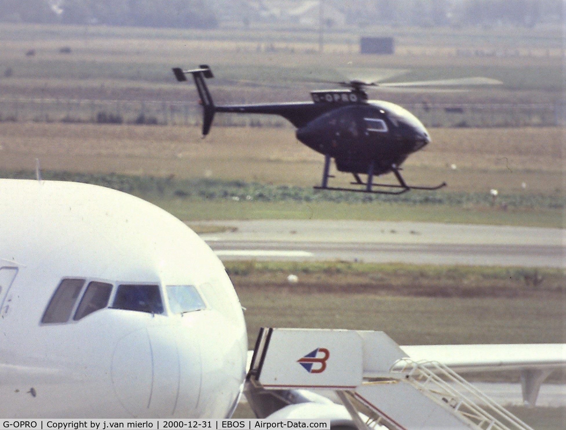 G-OPRO, 1990 McDonnell Douglas MD-500E (369E) C/N 0360E, Scan from slide