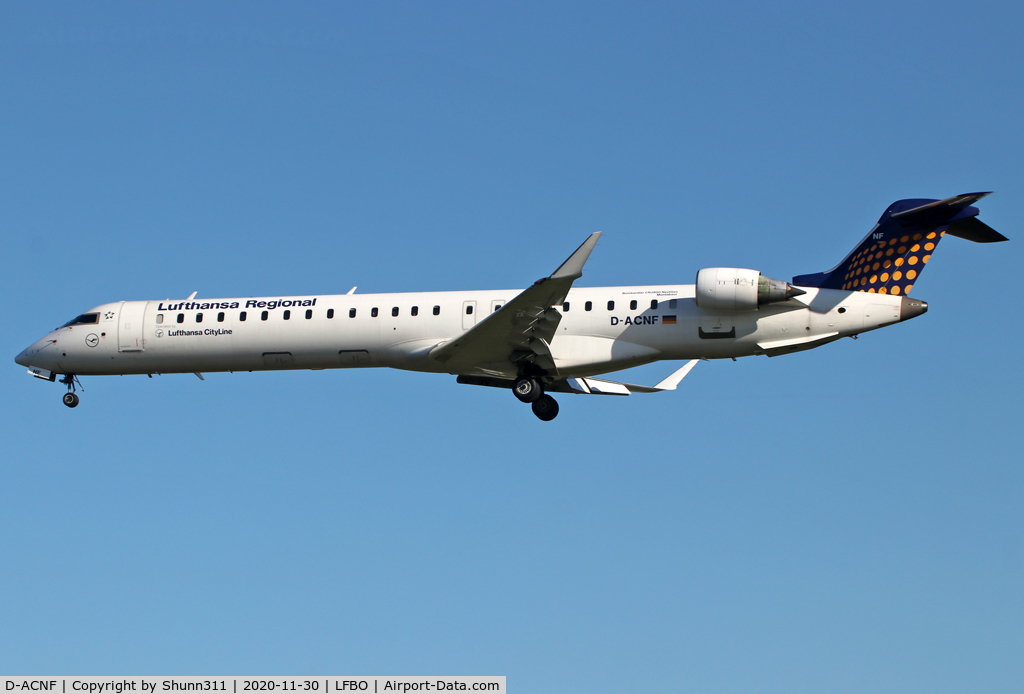 D-ACNF, 2009 Bombardier CRJ-900 (CL-600-2D24) C/N 15243, Landing rwy 32L in basic Eurowings c/s with Lufthansa Regional titles