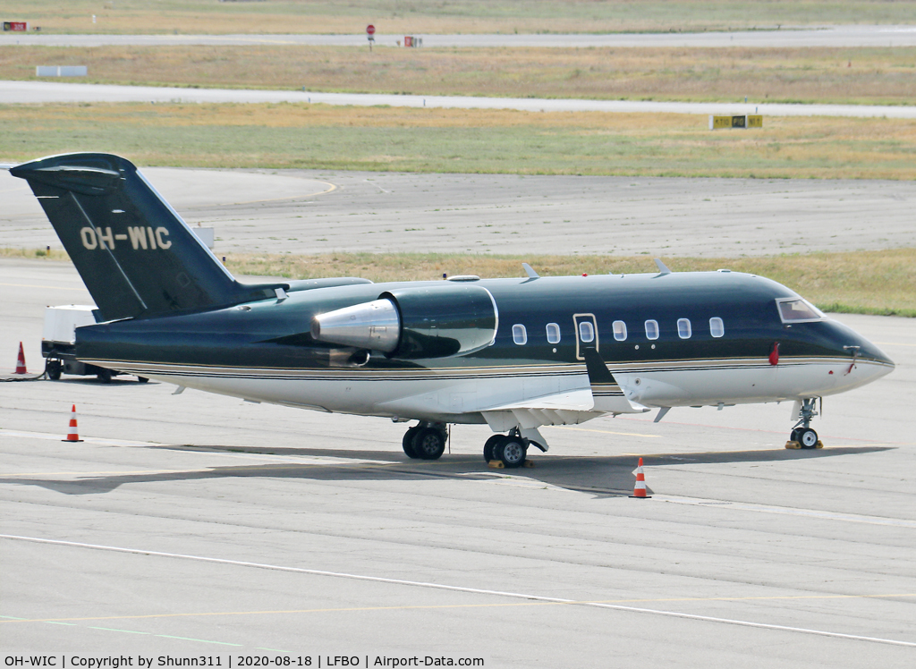 OH-WIC, 2000 Bombardier Challenger 604 (CL-600-2B16) C/N 5452, Parked at the General Aviation area...