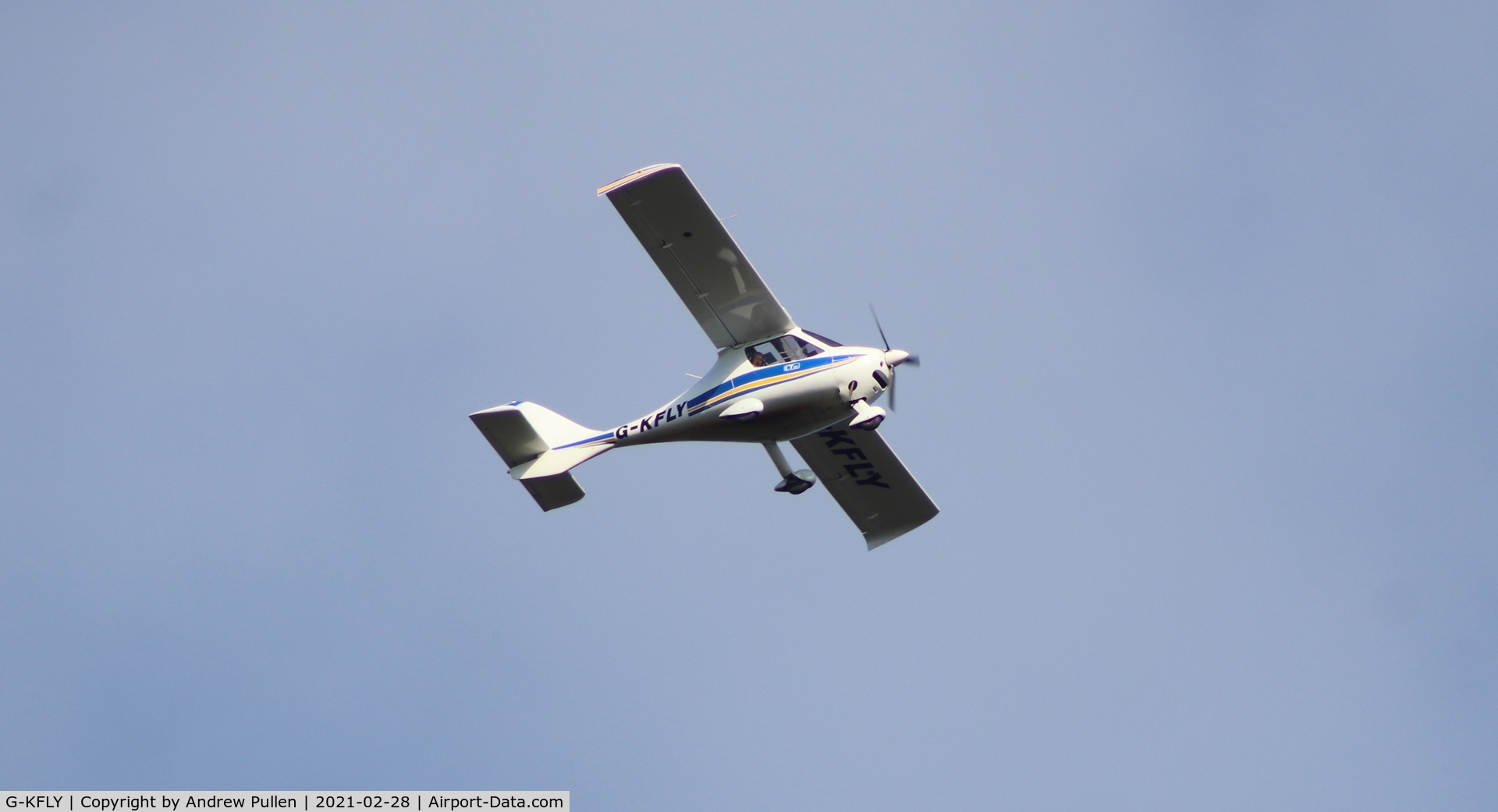 G-KFLY, 2007 Flight Design CTSW C/N 8244, Snapped this as it was flying over the river Great Ouse between Swavesey and Over in Cambridgeshire on 28th February 2021. 
I used a Canon 200D and an old pre-digital Canon EOS 75-300 zoom lens.