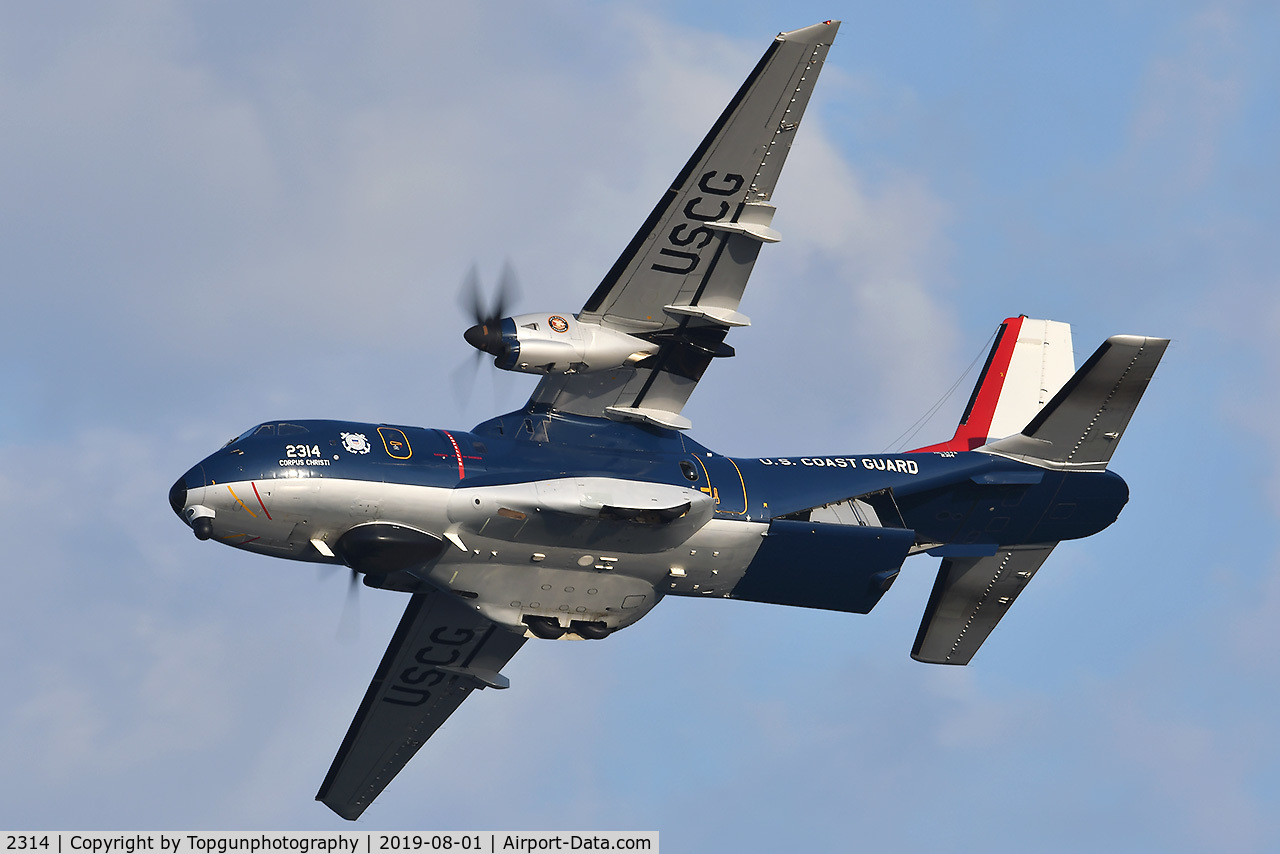 2314, 2014 Airtech HC-144A Ocean Sentry (CN-235M-300) C/N C203, Bicentennial Pained Ocean Sentry flying over the USCG Cutter Eagle