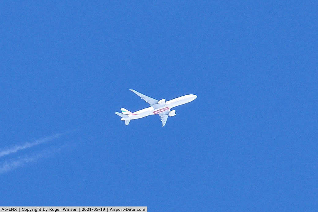 A6-ENX, 2014 Boeing 777-31H/ER C/N 42318, OTT. Seen at 35000 feet east bound over Swansea, Wales, UK. Operated by Emirates Airlines.
