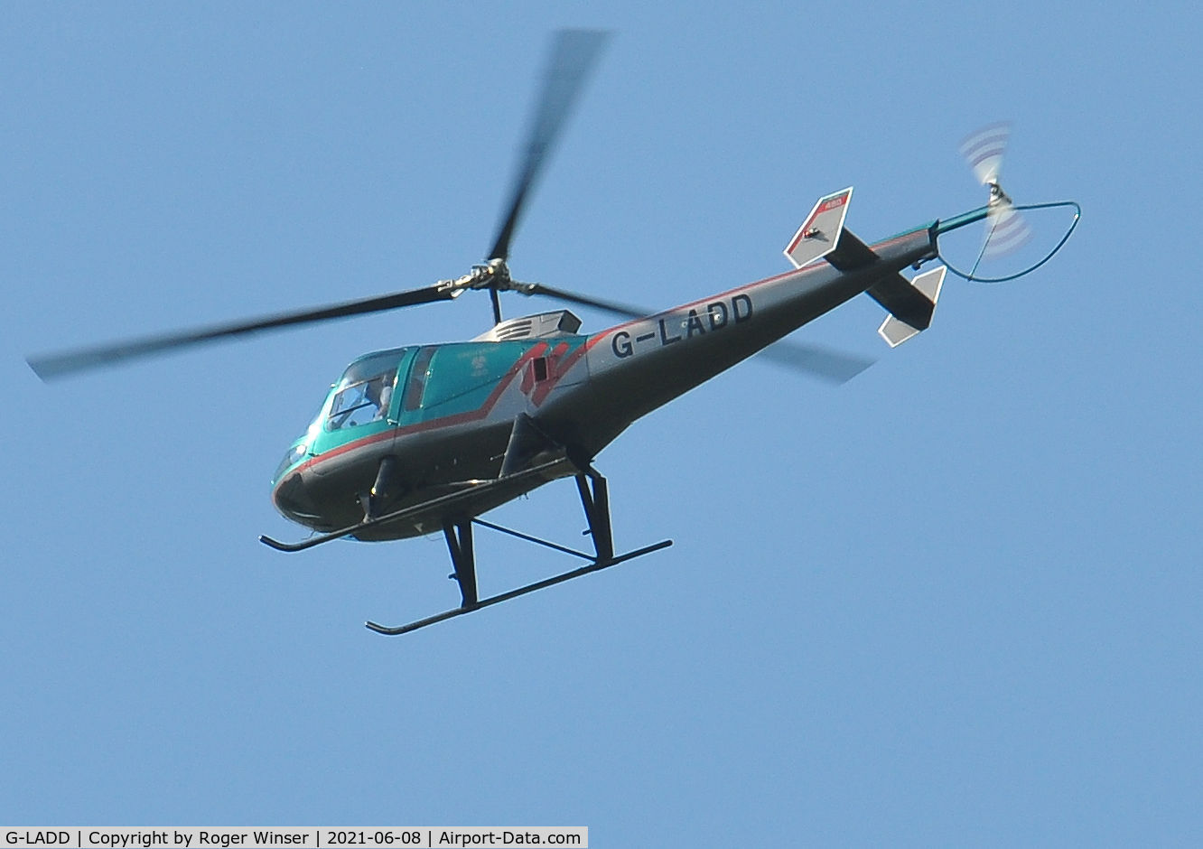 G-LADD, 1999 Enstrom 480 C/N 5037, Off airport. Seen flying over Swansea, Wales, UK returning to base.