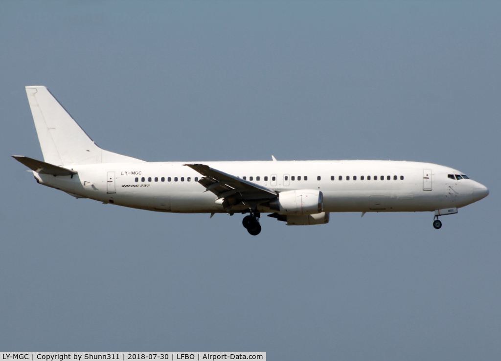 LY-MGC, 1991 Boeing 737-4Y0 C/N 24904, Landing in all white c/s without titles. Tunisair summer lease