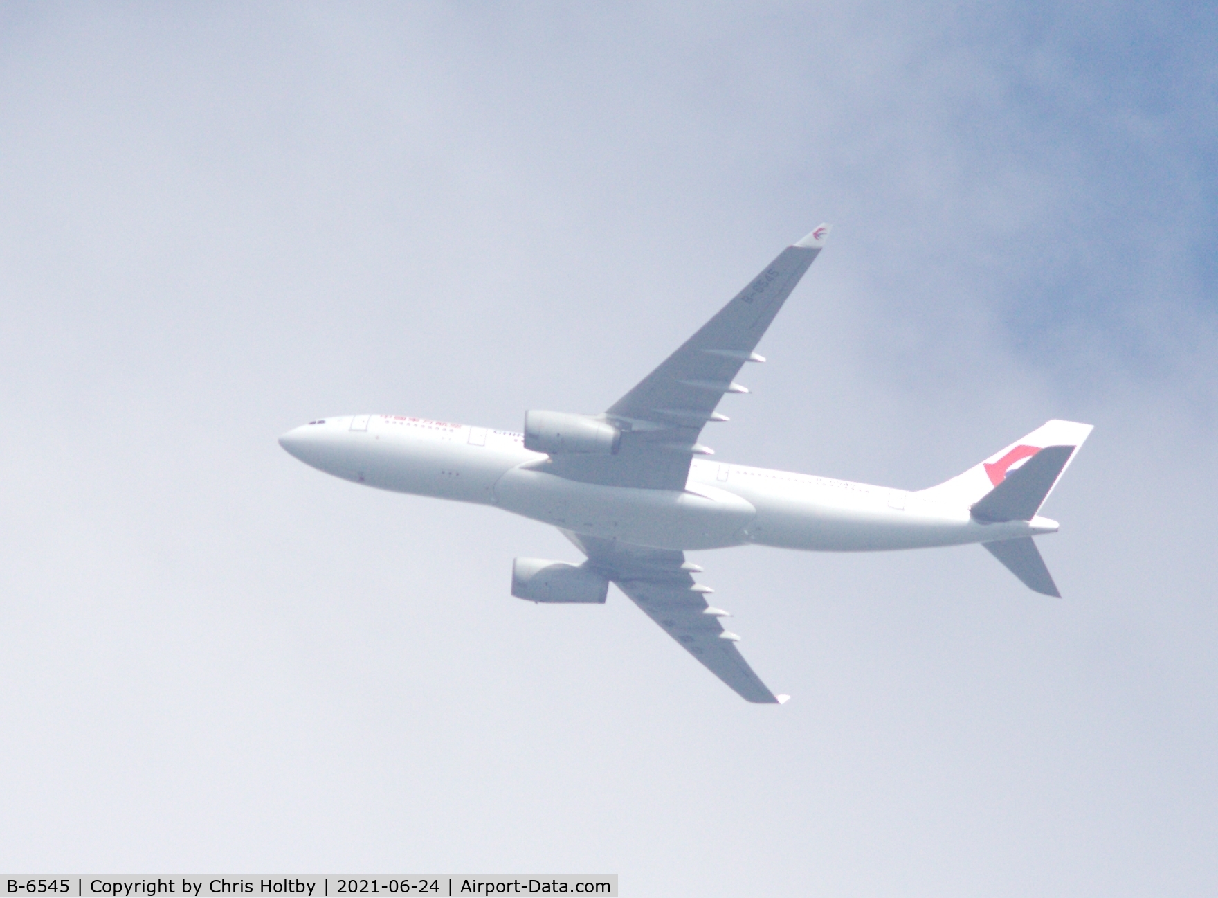 B-6545, 2011 Airbus A330-243 C/N 1291, Back in China Eastern Airlines livery over Potters Bar, Herts