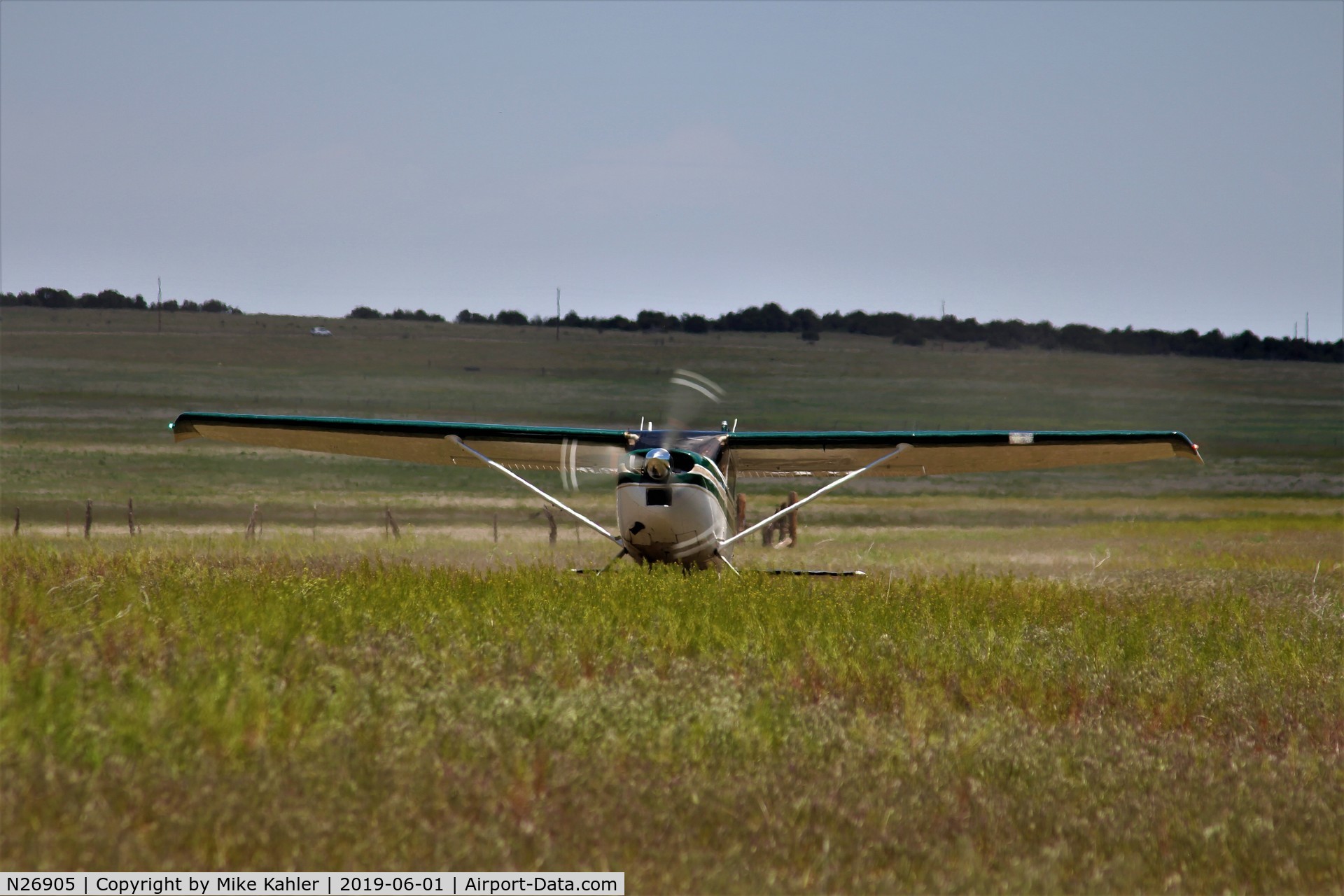 N26905, Cessna 180 C/N 18051354, Mowing the grass at Penny's.