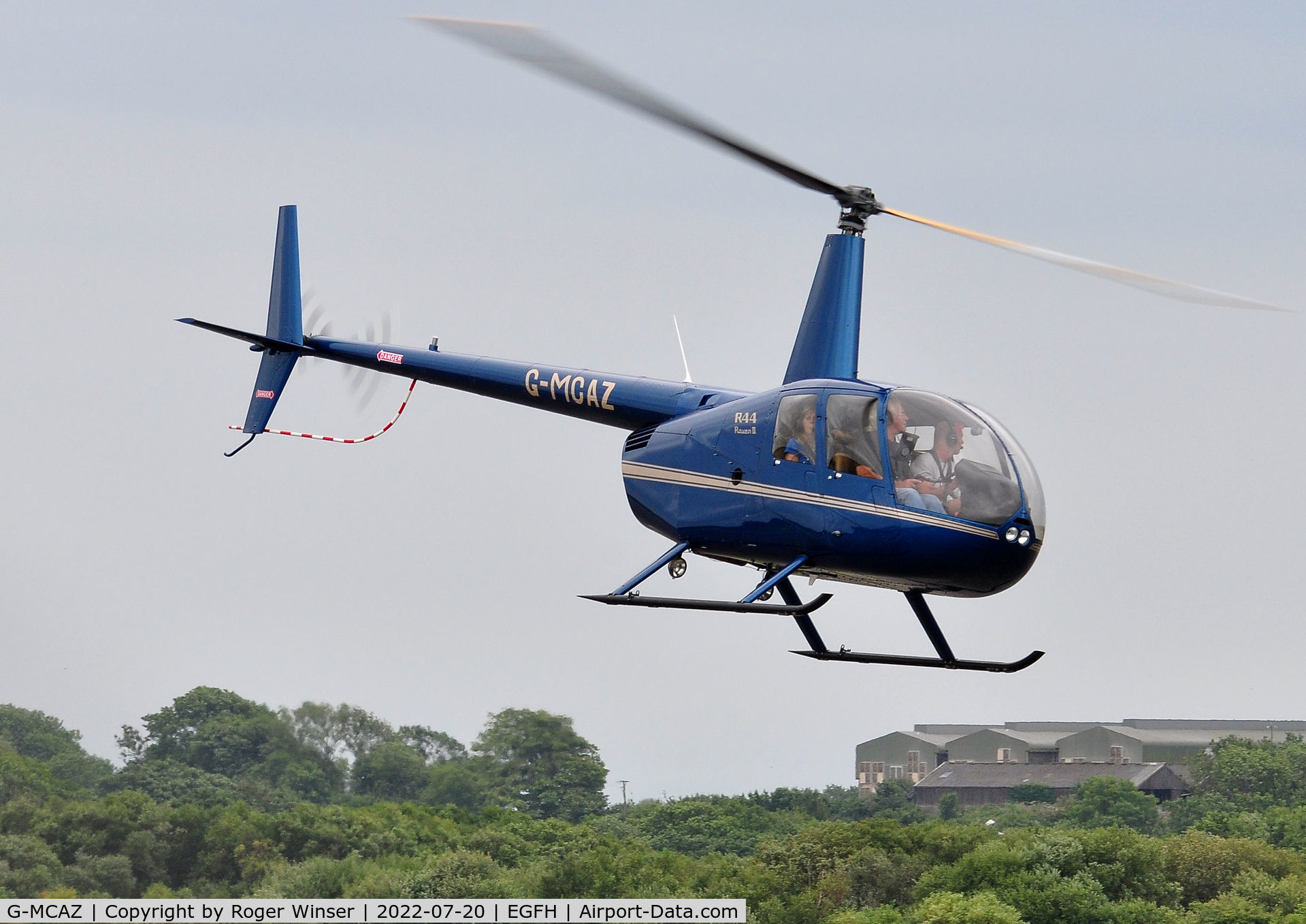 G-MCAZ, 2015 Robinson R44 Raven II C/N 13785, Visiting R44 departing.