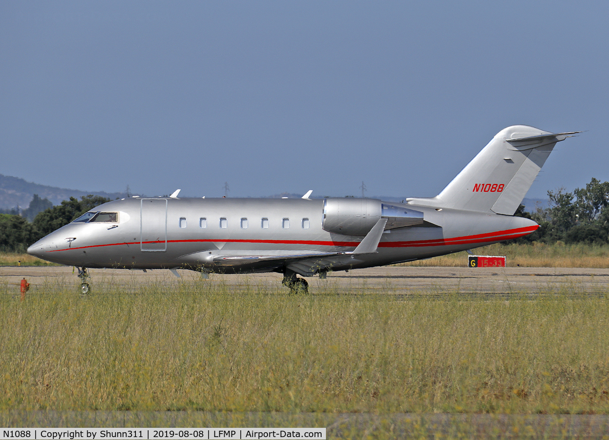 N1088, 2009 Bombardier Challenger 605 (CL-600-2B16) C/N 5798, Parked at the General Aviation area...