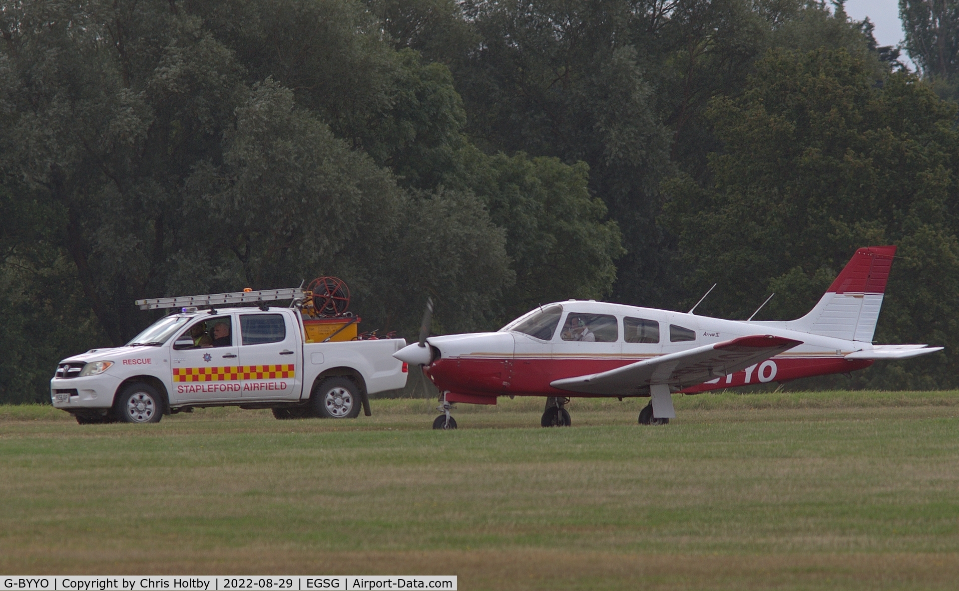 G-BYYO, 1994 Piper PA-28R-201 Cherokee Arrow III C/N 28R-2837061, Pilot alerted EGSG control tower to a possible landing gear problem but landed safely escorted by the airfield rescue service vehicle.