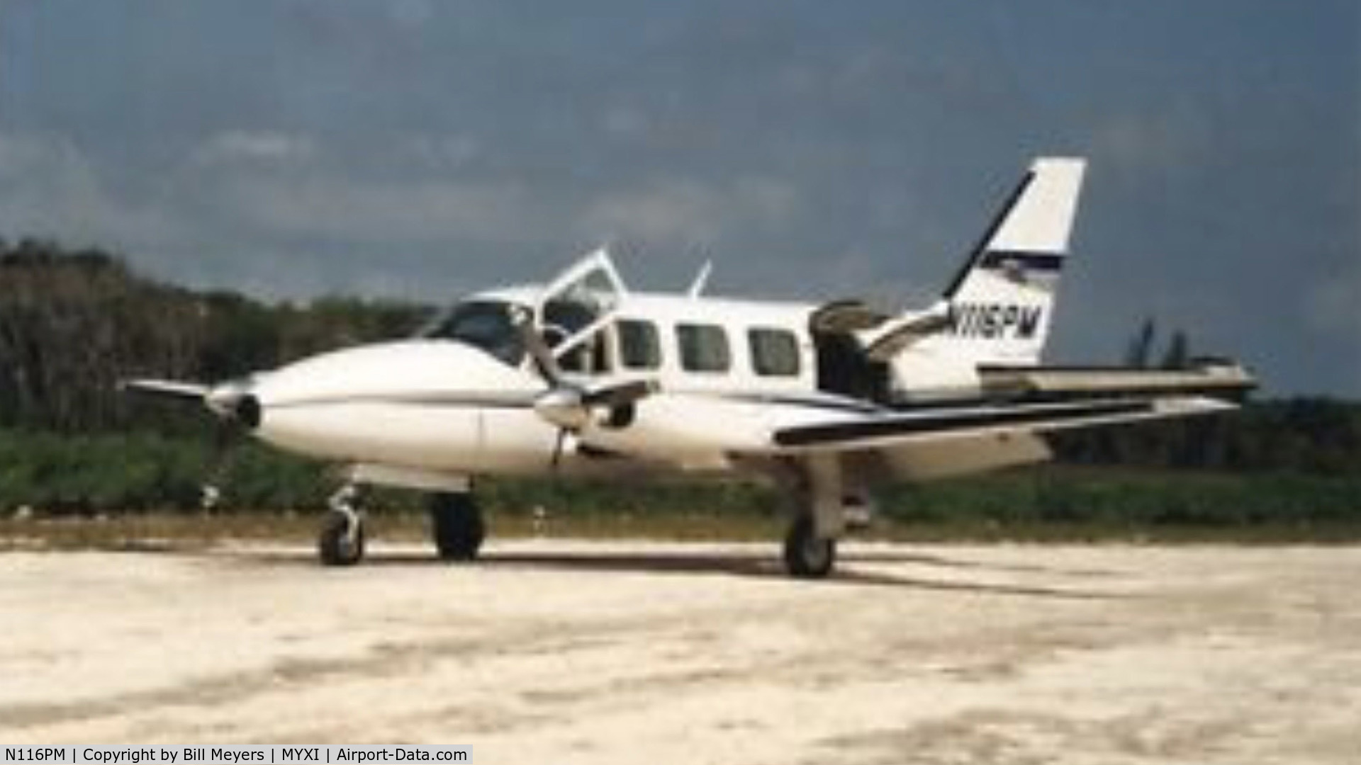N116PM, Piper PA-31-350 Chieftain C/N 31-8052127, N116PM on the ground at Scotland Cay Bahamas circa 1994