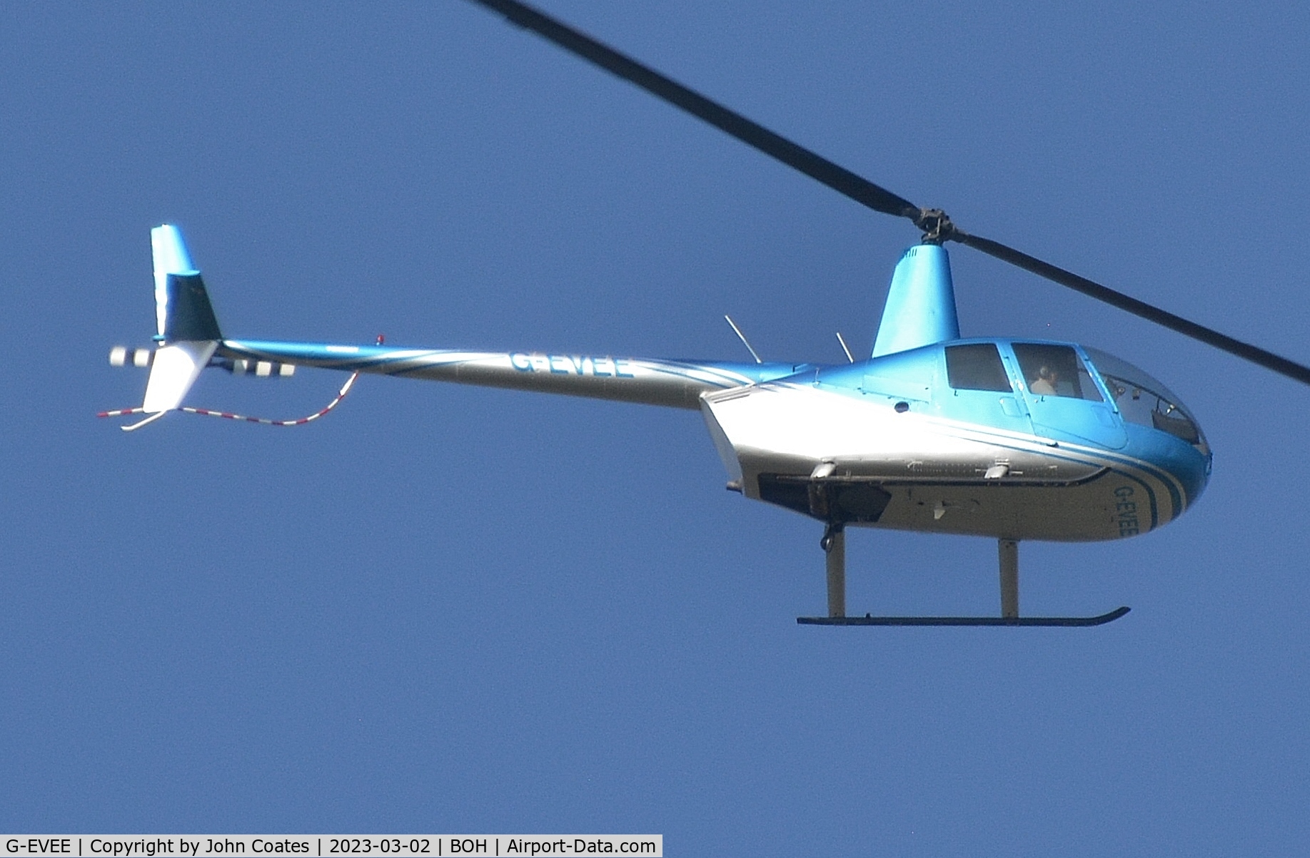 G-EVEE, 2005 Robinson R44 Raven C/N 1517, Looking bright and shiny near Lymington